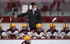 Gophers coach Brad Frost watched from the bench during a game earlier this season.