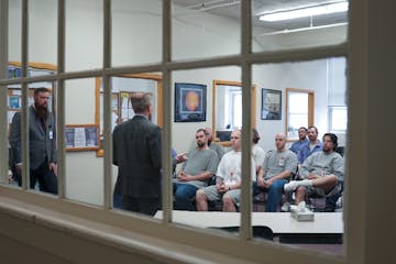 Secretary of State Steve Simon talks to inmates at the Minnesota Correctional Facility - St. Cloud on March 21 about the state's new law restoring vot