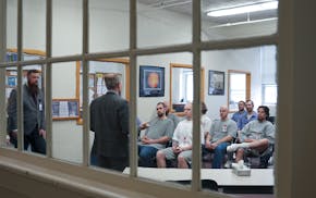 Secretary of State Steve Simon talks to inmates at the Minnesota Correctional Facility - St. Cloud on March 21 about the state's new law restoring vot
