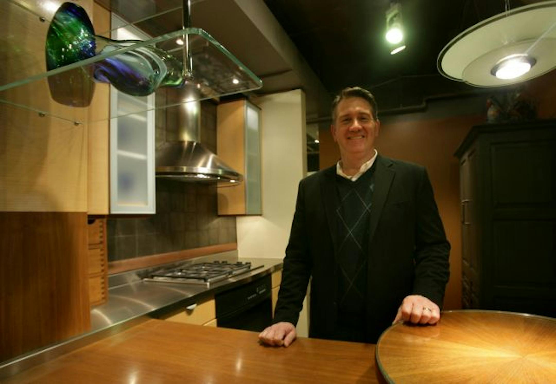 Bringing customers into Sawhill Kitchens & Design in International Market Square (IMS) hasn't been easy during the economic downturn. Sawhill's owner, Tim Aden, has introduced lunch seminars and showroom tours of IMS to drive interest.