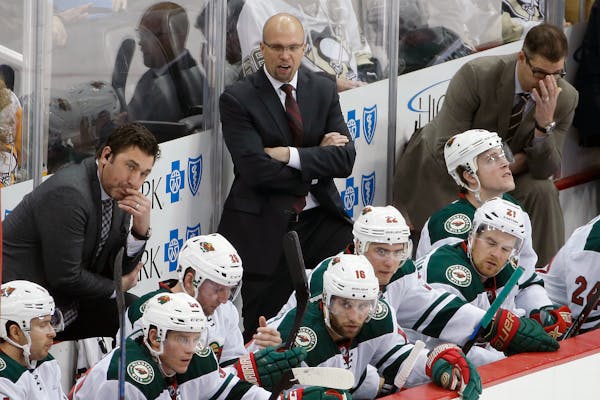 Wild coach Mike Yeo and his staff face a tough task: rallying a team from 12th place in the Western Conference to a playoff position.