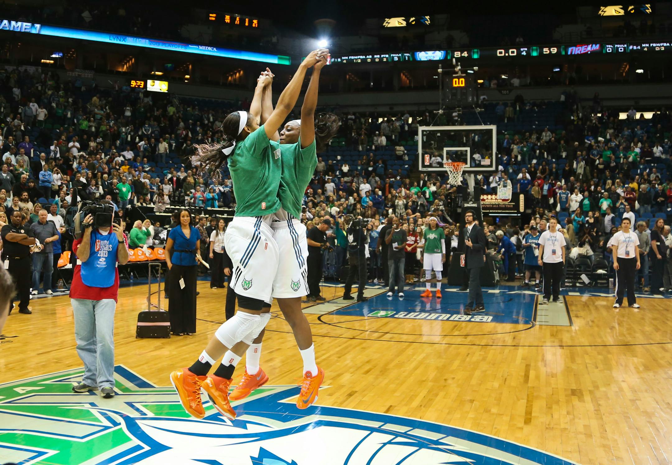 Maya Moore and Monica Wright did a congratulation leap after the Lynx won game one of the WNBA finals.