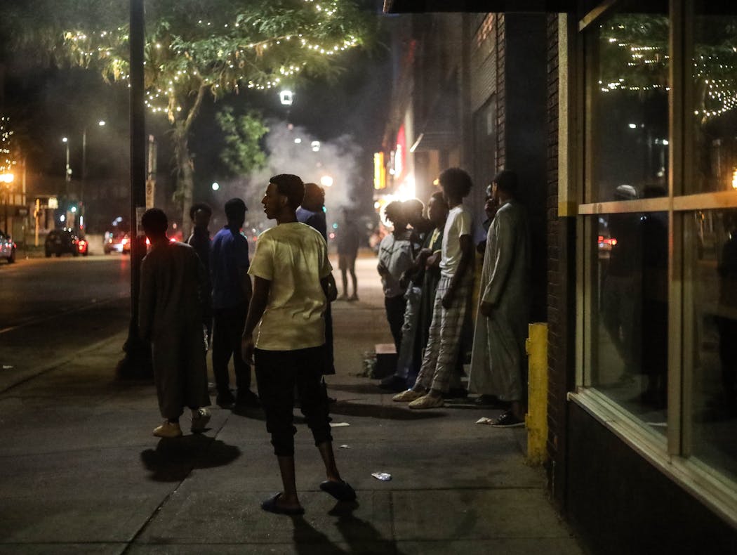 Young Somali men were ministering to a crowd of teens when someone drove by launching fireworks at them.