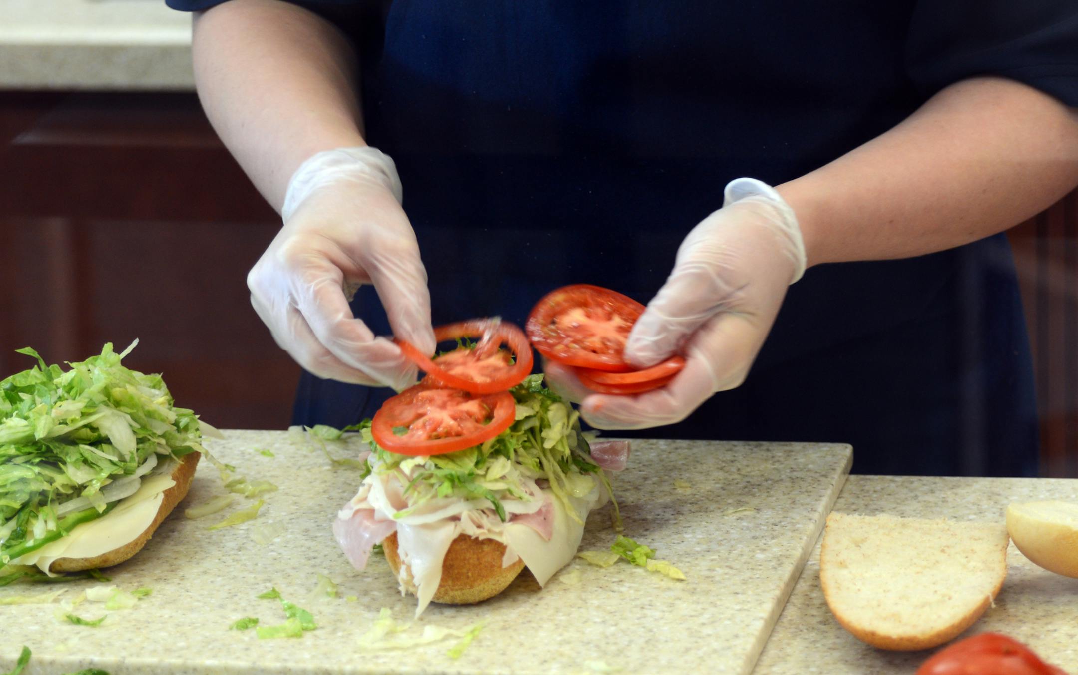 The sandwich shop Jersey Mike's is expanding in Minnesota. The chain is part of the mounting success of "fast-casual" restaurants, which offer relatively cheap fare but higher-quality food and atmosphere than their fast-food counterparts.] Richard.Sennott@startribune.com Richard Sennott/Star Tribune. Blaine, Minnesota Monday 6/118/13) ** (cq)