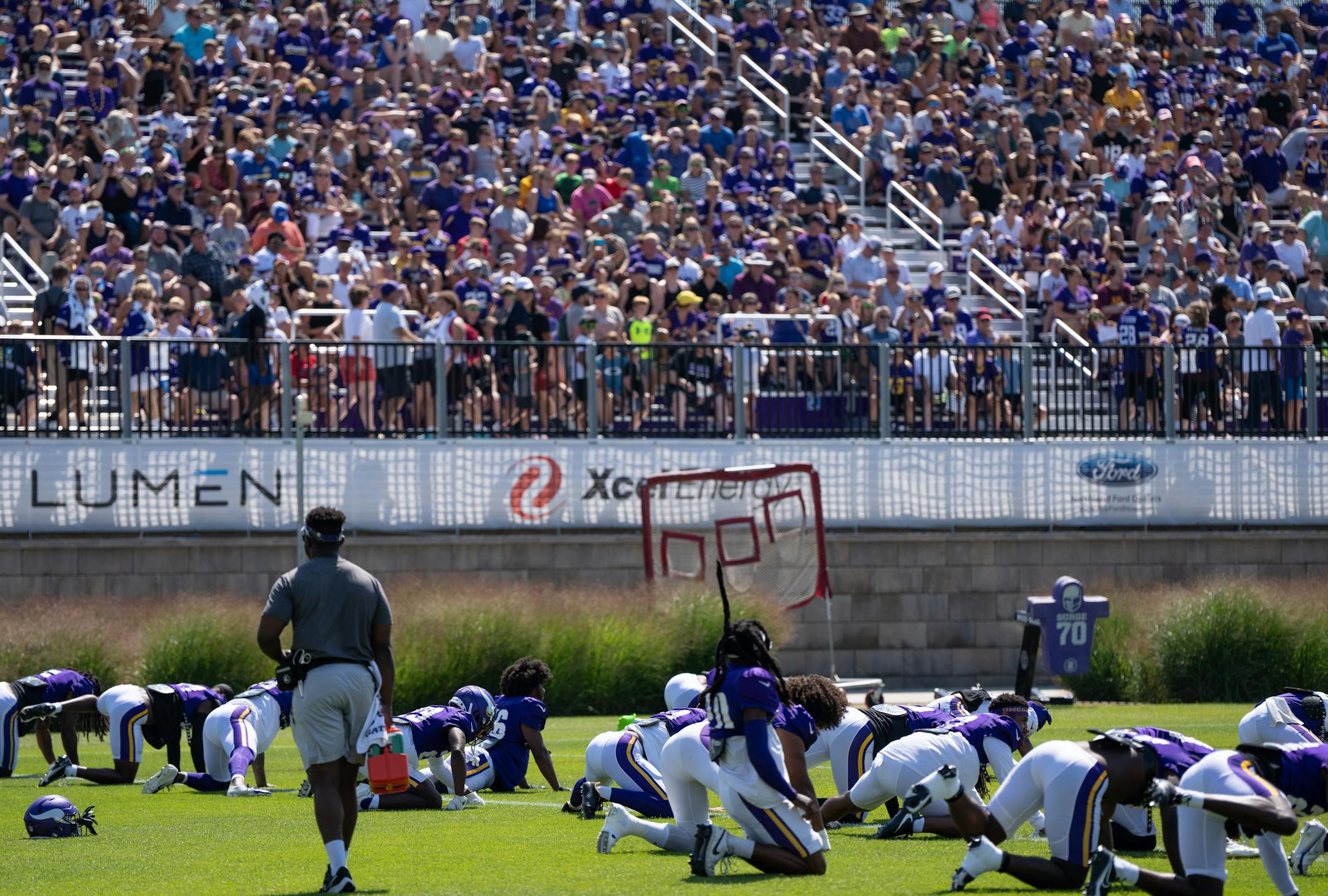 Players stretch during Vikings Training Camp.