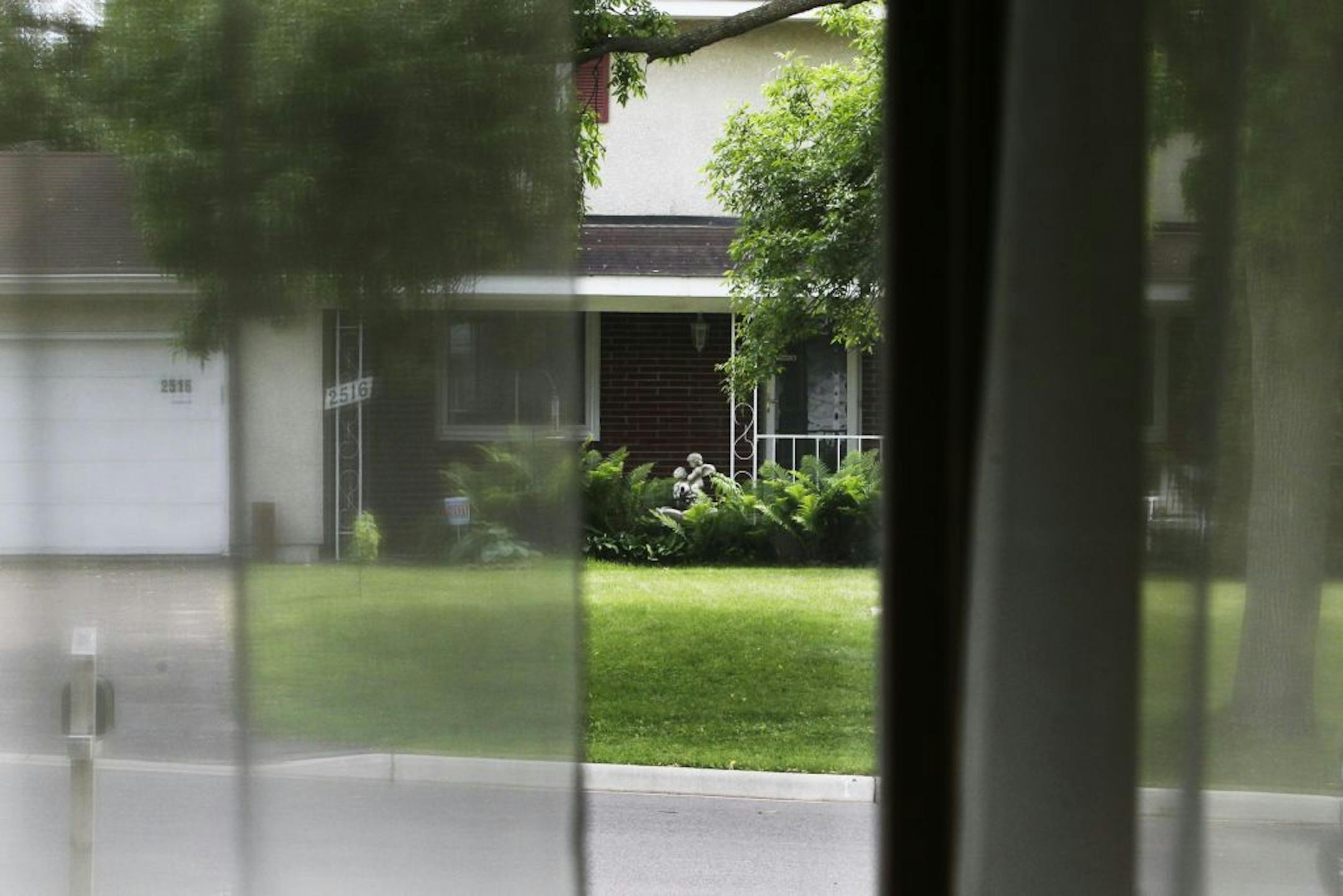 The view from Kim and Greg Hoffman's house in White Bear Lake of the home of Lori Christensen, who will be in court Tuesday.