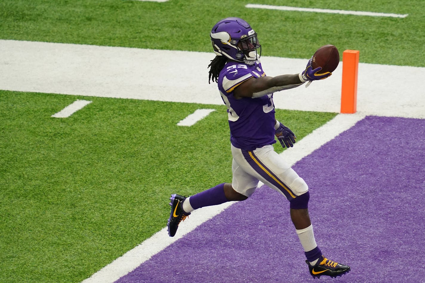 Vikings running back Dalvin Cook sprinted into the end zone for a 70-yard touchdown run in the fourth quarter against the Lions on Sunday.