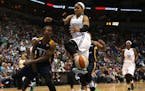 Indiana's Tamika Catchings knocked the ball out of the hands of Lynx' Maya Moore during Game 1.