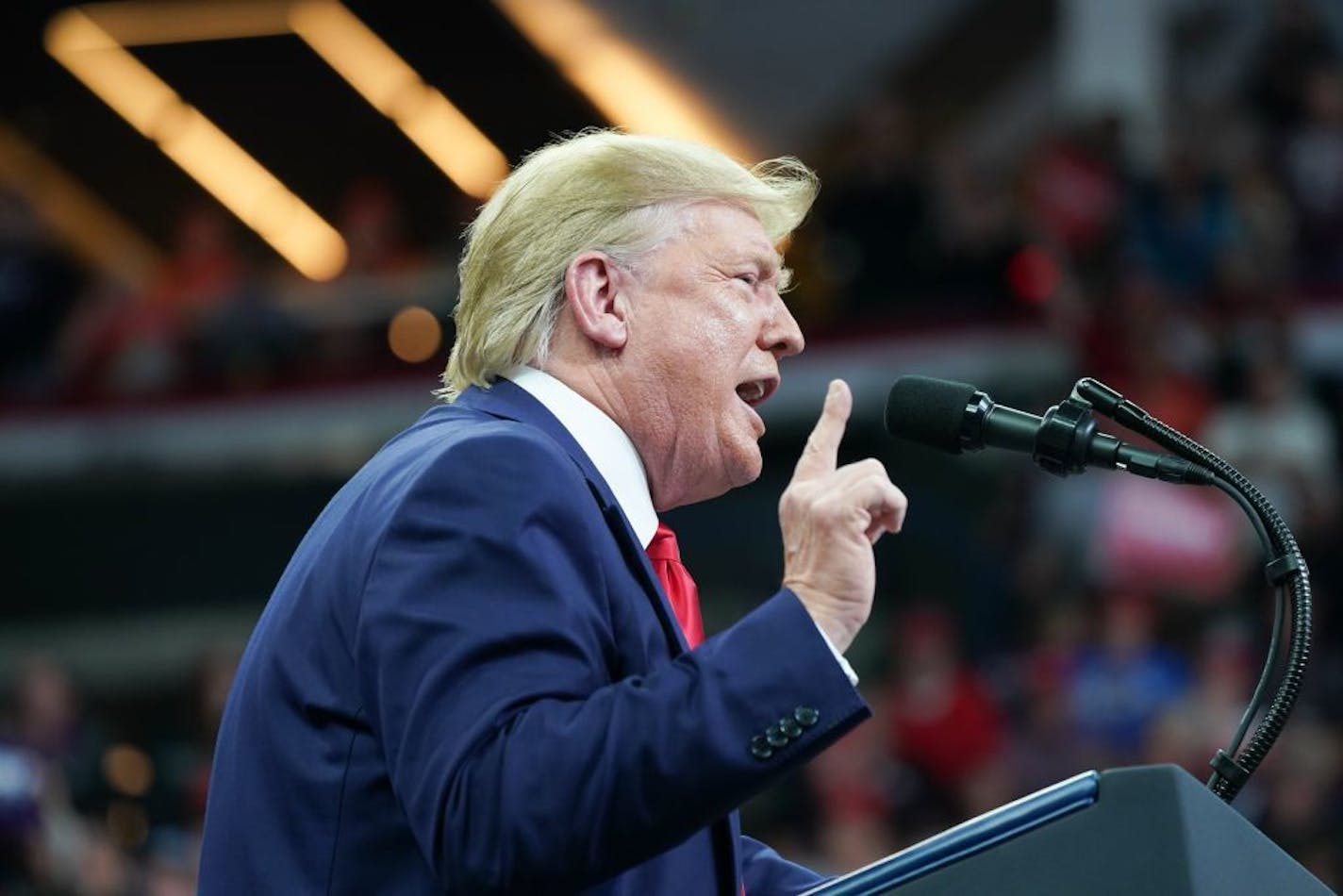 President Donald Trump greeted cheering crowds at the Target Center in Minneapolis, Minnesota.