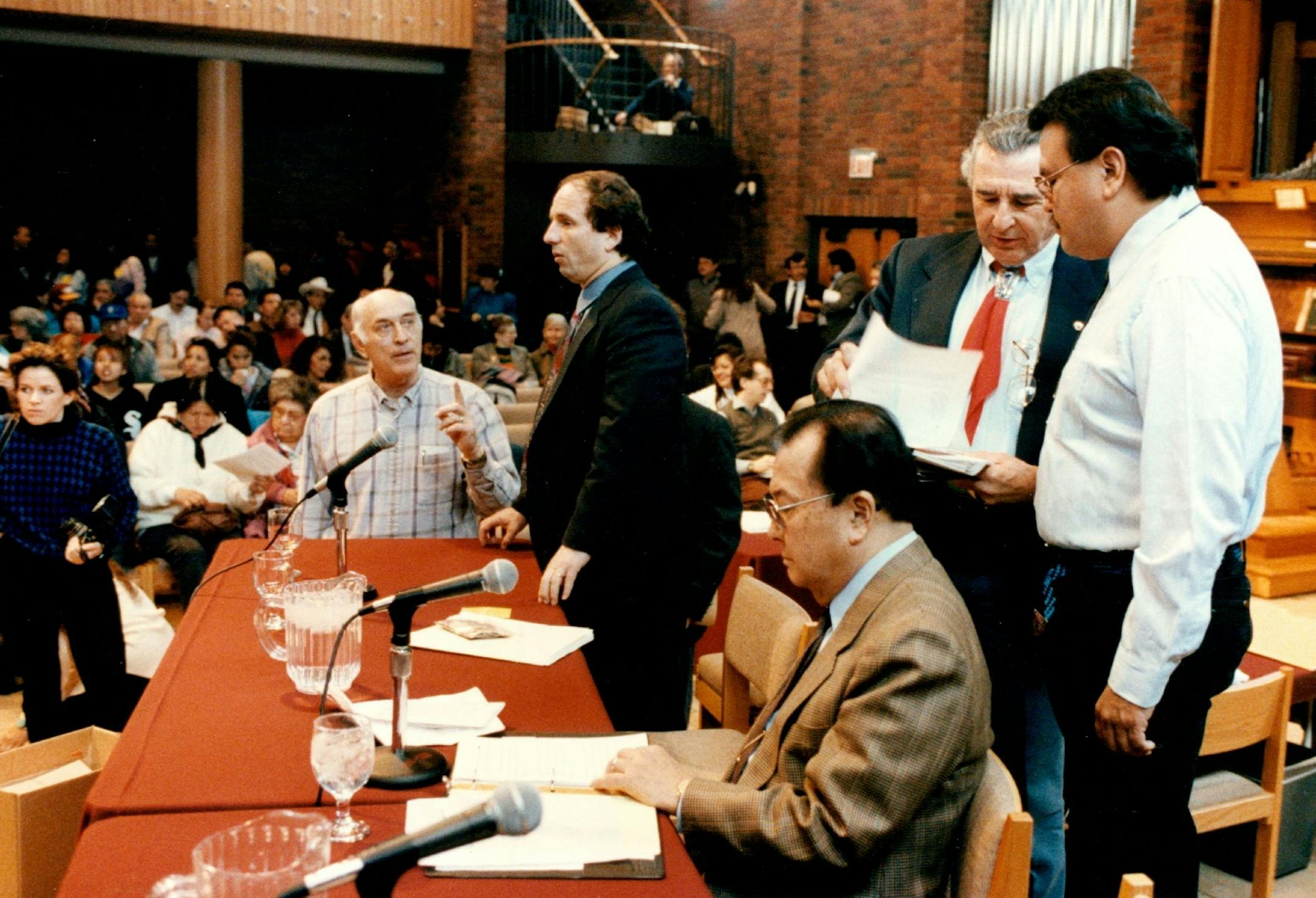 March 8, 1993; Sen. Paul Wellstone, Sen. Daniel K. Inouye, seated, and Sen. Ben Nighthorse Campbell, second from right, prepared to start the hearing on Native American Religious Freedom.