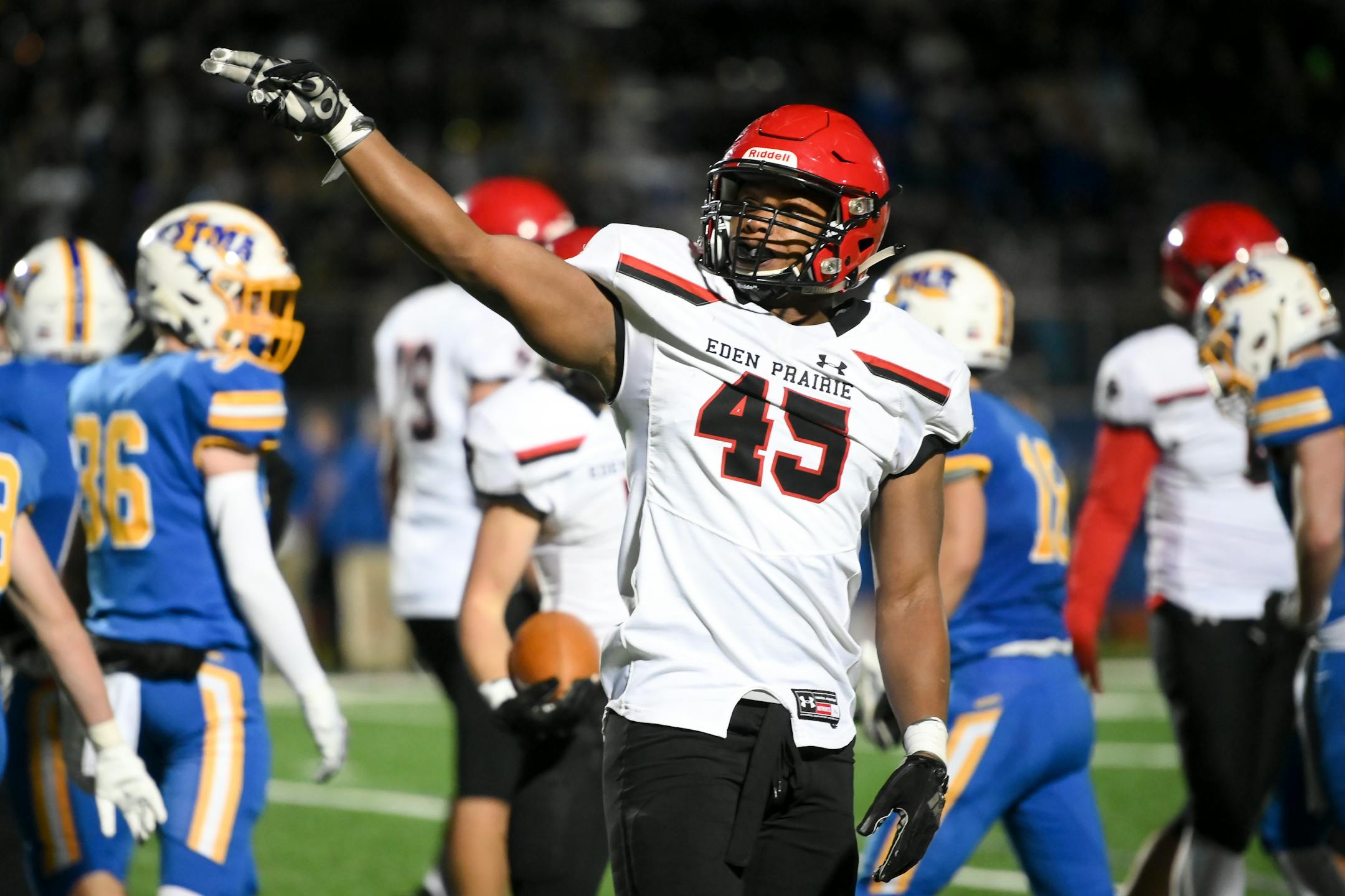 Eden Prairie linebacker Justice Sullivan will play football for Iowa, he announced Sunday. He is the son of Jake Sullivan, former Tartan and Iowa State basketball star.