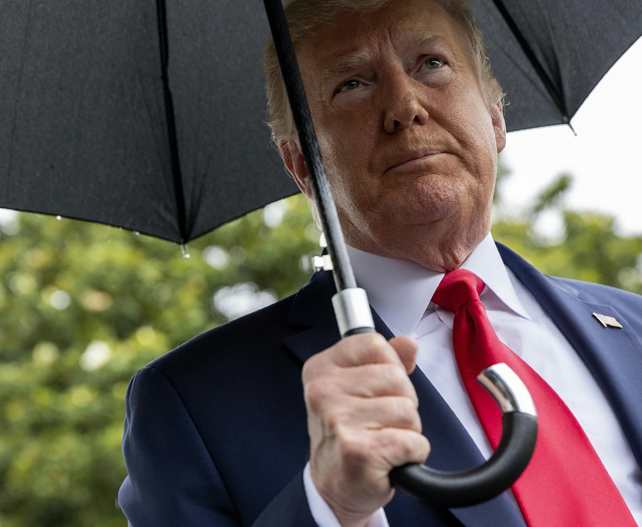 President Donald Trump listens to a reporter's question on the South Lawn of the White House in Washington, Saturday, June 20, 2020, before boarding Marine One for a short trip to Andrews Air Force Base, Md., and then on to Tulsa, Okla., for a campaign rally. (AP Photo/Patrick Semansky)