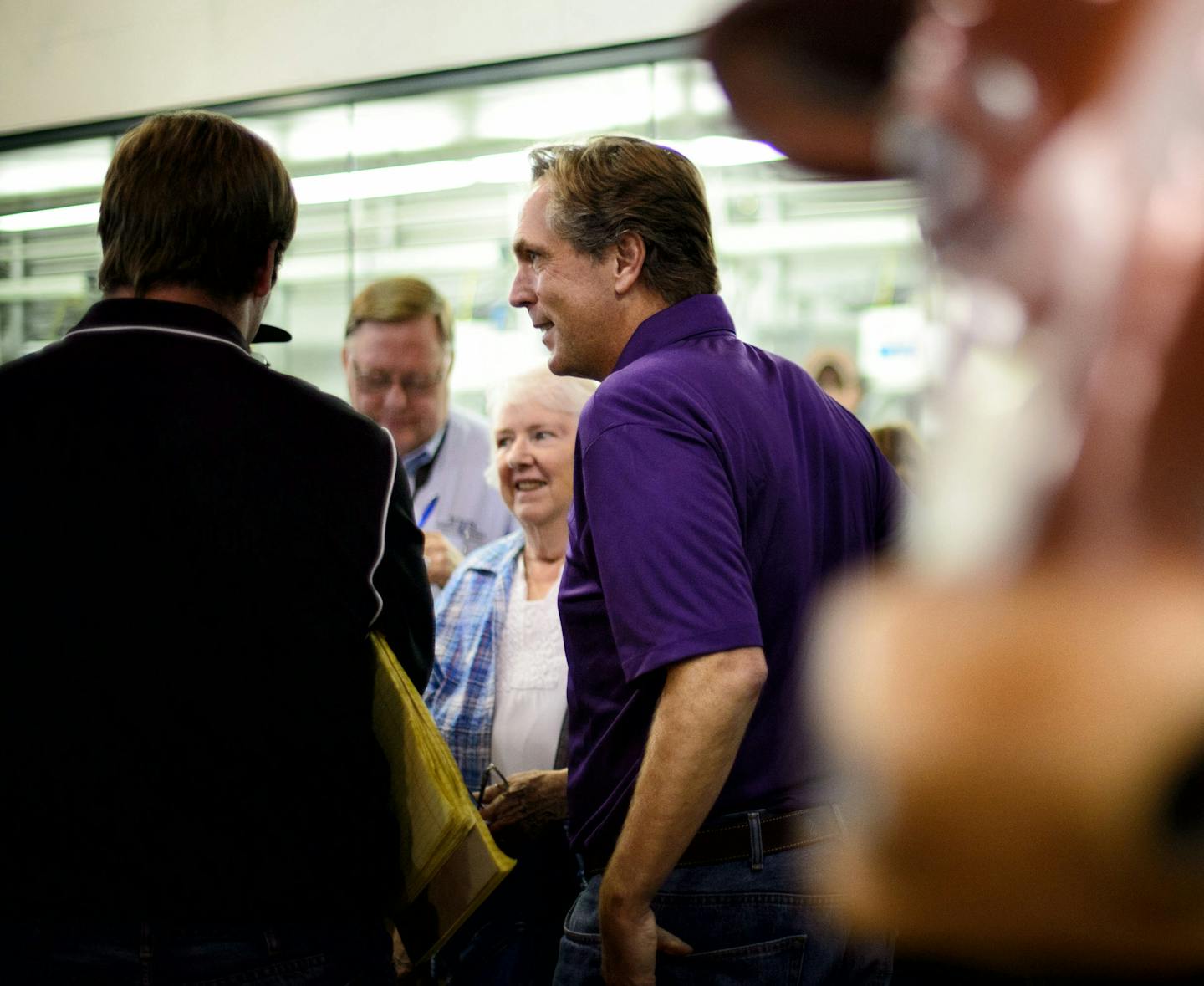 GOP Senate candidate Mike McFadden laughed with Larry and Evy Walters of Brooklyn Park in the State Fair Cattle Barn. Larry Walters then asked if he could see son Connor's scar from where Mike removed the stitches, featured in his current Television ad. ] Falcon Heights , MN -- Thursday, August 28, 2014. GLEN STUBBE * gstubbe@startribune.com