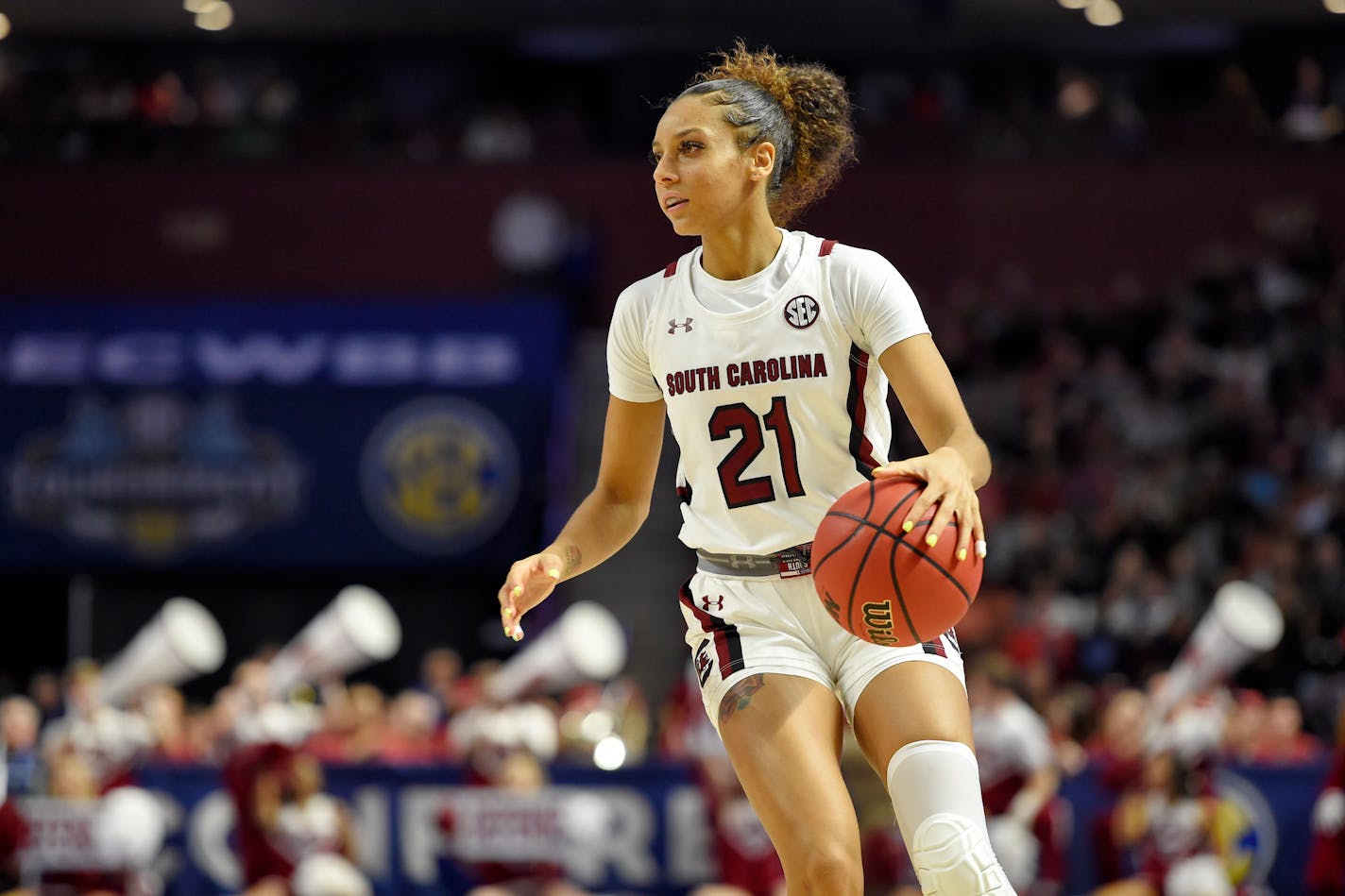 South Carolina's Mikiah Herbert-Harrigan dribbles during the second half of a semifinal match against Arkansas at the Southeastern Conference women's basketball tournament.