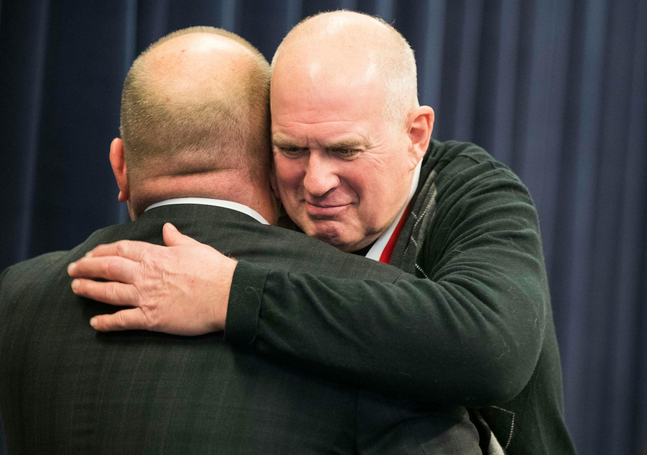 Retired St. Paul Police officer James Groh hugs St. Paul Police chief Todd Axtell during the ceremony. ] LEILA NAVIDI ï leila.navidi@startribune.com BACKGROUND INFORMATION: Thirty-six years after 6-year-old Cassie Hansen was kidnapped, strangled and left in dumpster, the team of officers and a civilian will be recognized for breaking one of St. Paul's most infamous murder cases during a ceremony at St. Paul Police Department's Western District office on Wednesday, December 13, 2017. The case was