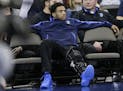 Creighton's Maurice Watson Jr., out for the season due to a torn ACL, sits on the bench during the second half of an NCAA college basketball game agai