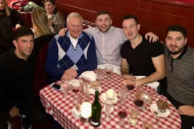 Jerry West took the Los Angeles Clippers' video crew to Dan Tana's, the famed Hollywood restaurant. Dan Fitzpatrick, from Edina, center, has his arm a
