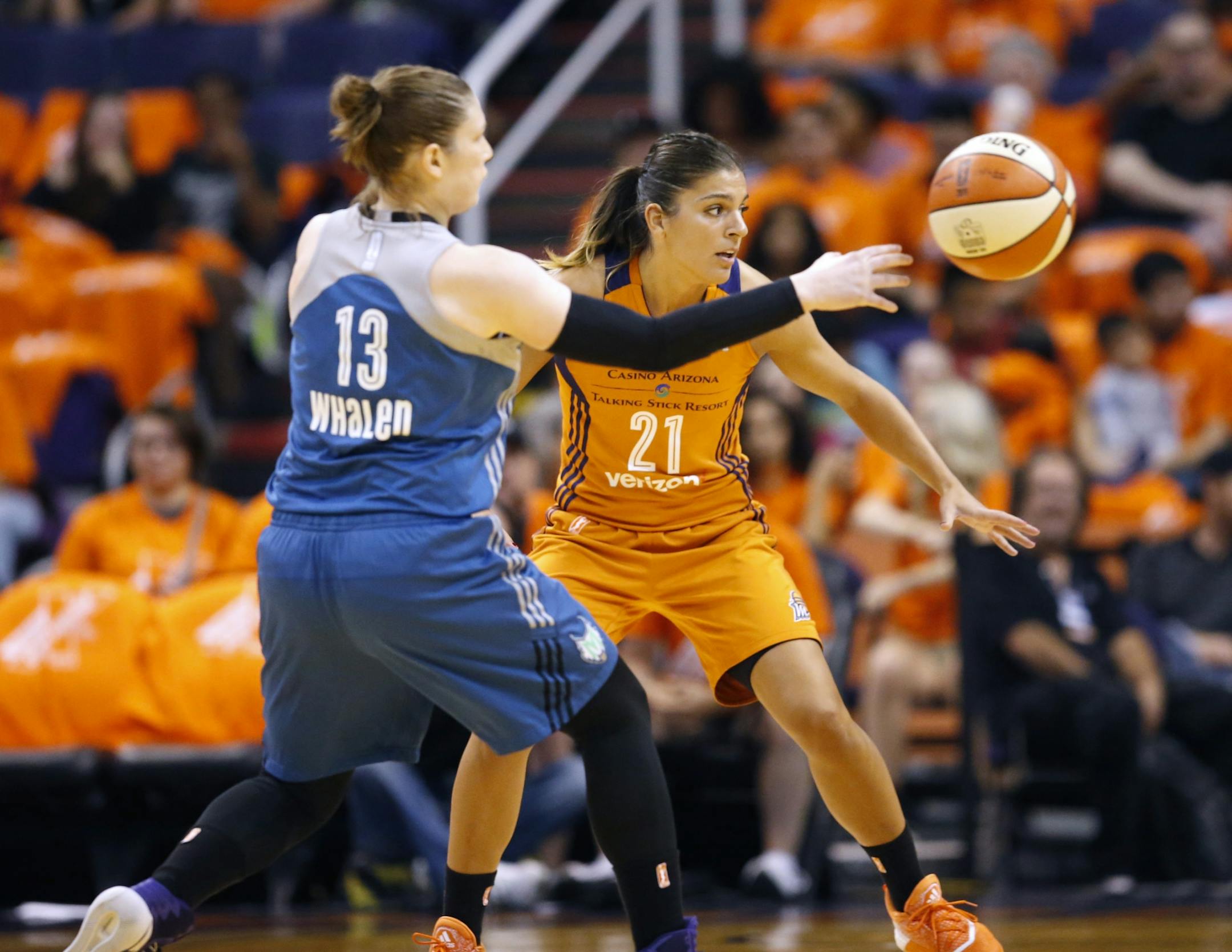 Minnesota Lynx Lindsay Whalen passes the ball around Phoenix Mercury Marta Xargay during game 3 of the WNBA basketball semifinals in Scottsdale, Ariz., Sunday, Oct. 2, 2016. (Cheryl Evans/The Arizona Republic via AP) MARICOPA COUNTY OUT, NO SALES