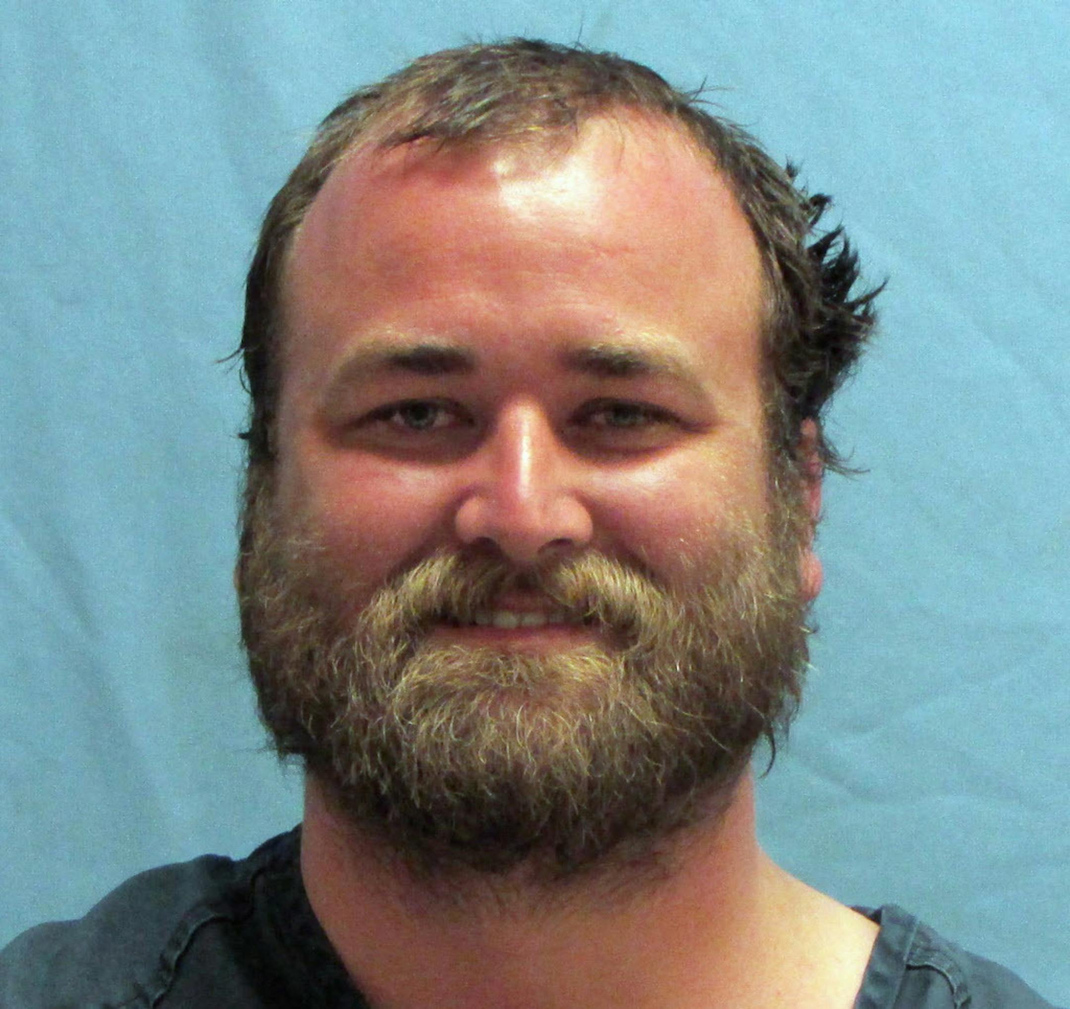 This photo provided by the Pulaski County Sheriff's Office in Little Rock, Ark., shows Michael Tate Reed, of Van Buren, Ark., who was booked into the jail Wednesday morning, June 28, 2017, on preliminary charges of defacing objects of public interest, criminal trespass and first-degree criminal mischief. He is accused driving a vehicle into Arkansas' new Ten Commandments monument on the state Capitol grounds in Little Rock. (Pulaski County Sheriff's Office via AP)