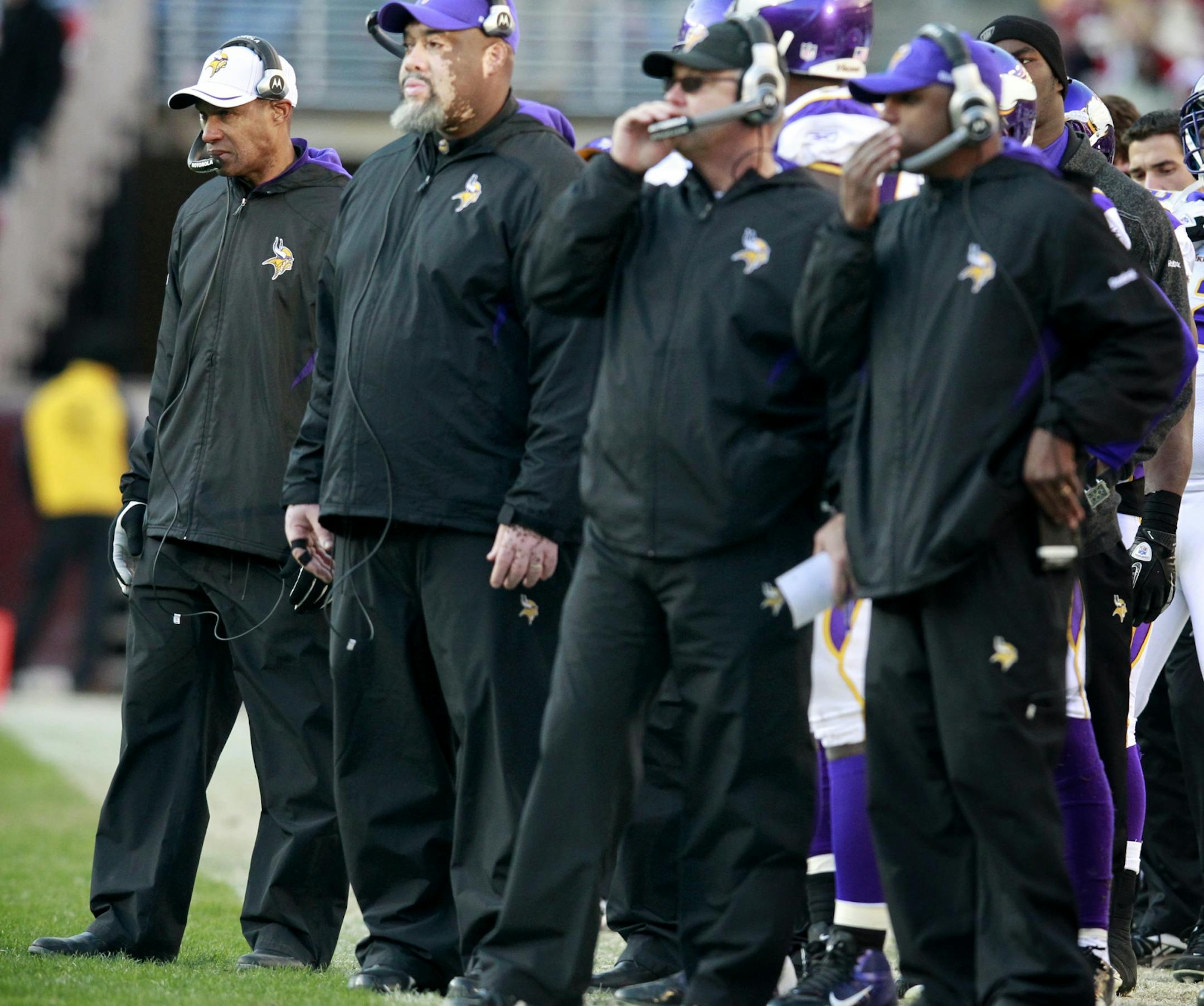 Vikings head coach Leslie Frazier (left) and coaching staff watched from the sidelines in the fourth quarter.