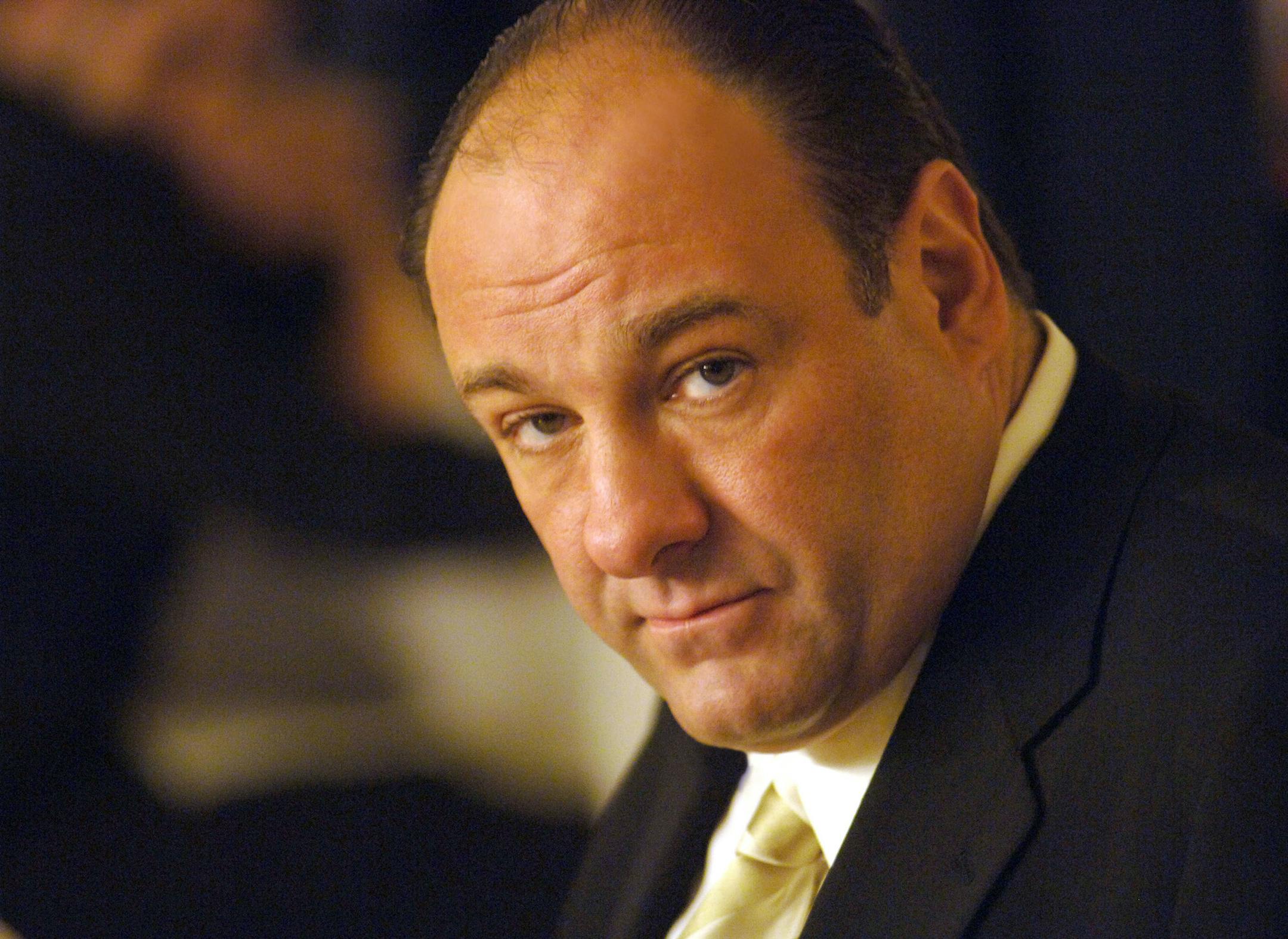 FILE - This undated publicity photo released by HBO, shows actor James Gandolfini in his role as Tony Soprano, head of the New Jersey crime family portrayed in HBO's "The Sopranos." Funeral services for actor James Gandolfini are scheduled for Thursday, June 27, 2013, at the Cathedral Church of Saint John the Divine in New York City. Gandolfini died June 19, 2013 in Italy. He was 51. (AP Photo/HBO, Barry Wetcher, File)