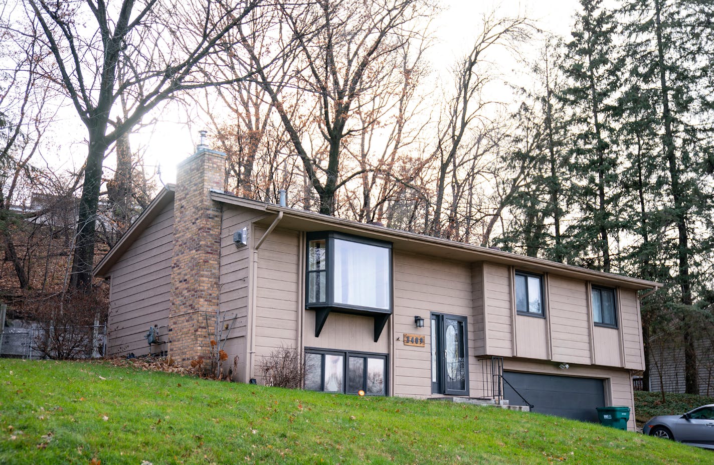 The exterior of a house recently sold to investors for more than the asking price, as seen on Wednesday, Dec. 1, 2021 on Brookview Dr. in Burnsville, Minn. The house is being used as a rental. ]