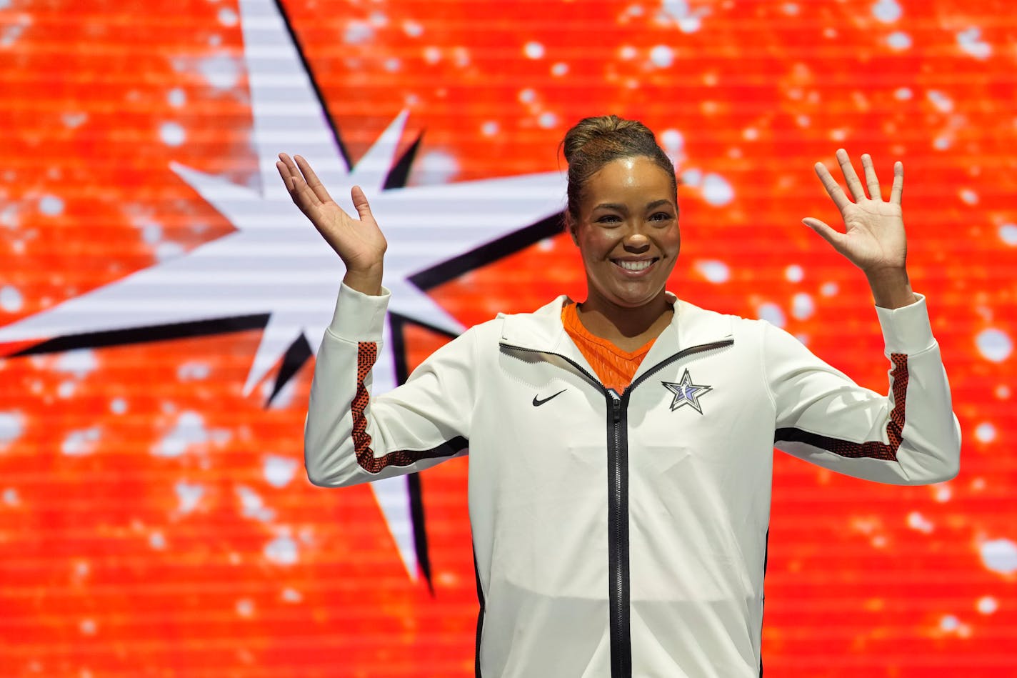 Minnesota Lynx's Napheesa Collier, of Team Stewart, reacts as she is introduced before a WNBA All-Star basketball game Saturday, July 15, 2023, in Las Vegas. (AP Photo/John Locher)