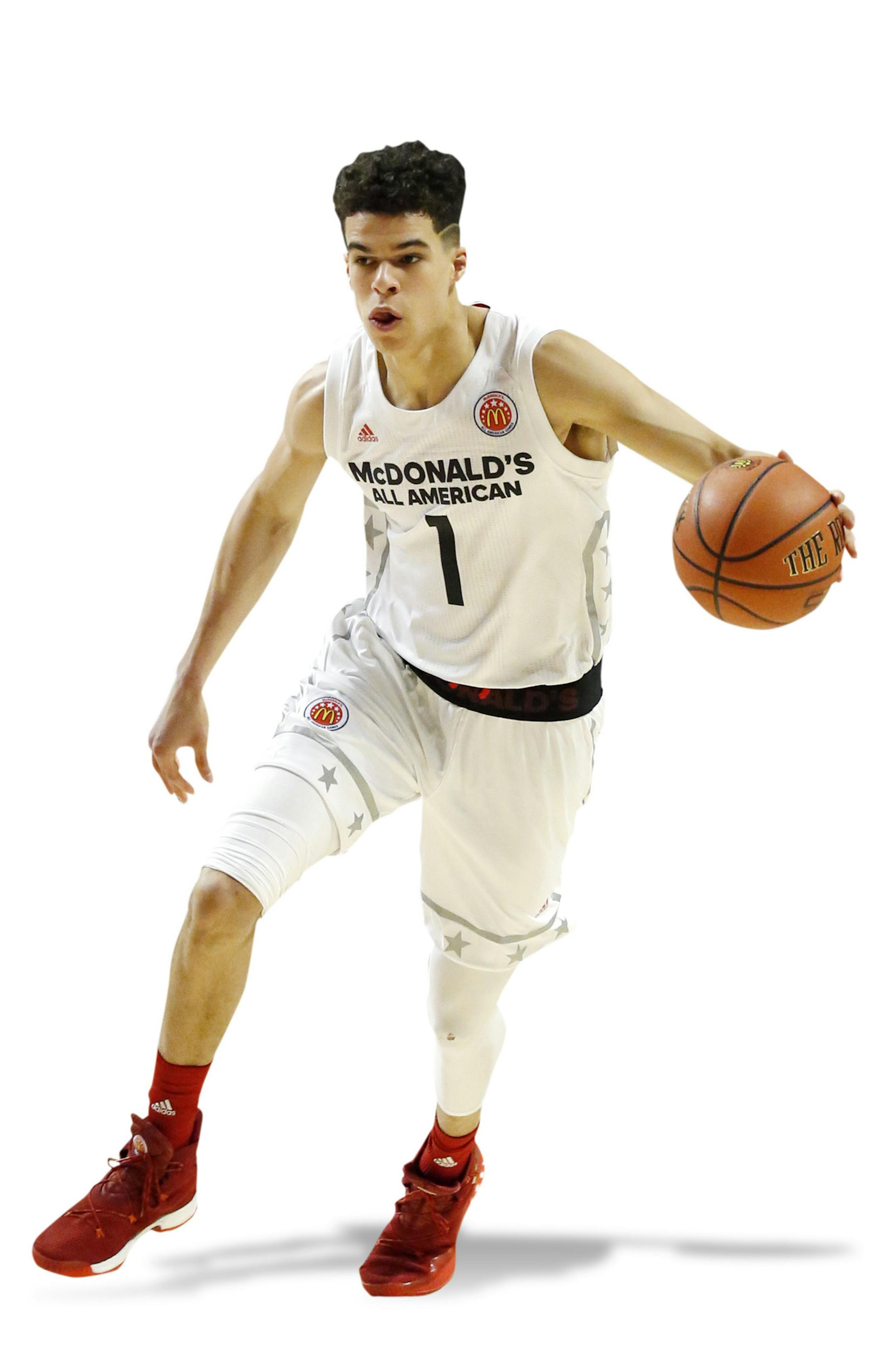 Big West's Michael Porter Jr (1) controls the ball against Big East during the first half of the McDonald's All- American boys high school basketball game in Chicago, Wednesday, March 29, 2017. (AP Photo/Nam Y. Huh) ORG XMIT: OTKNH204