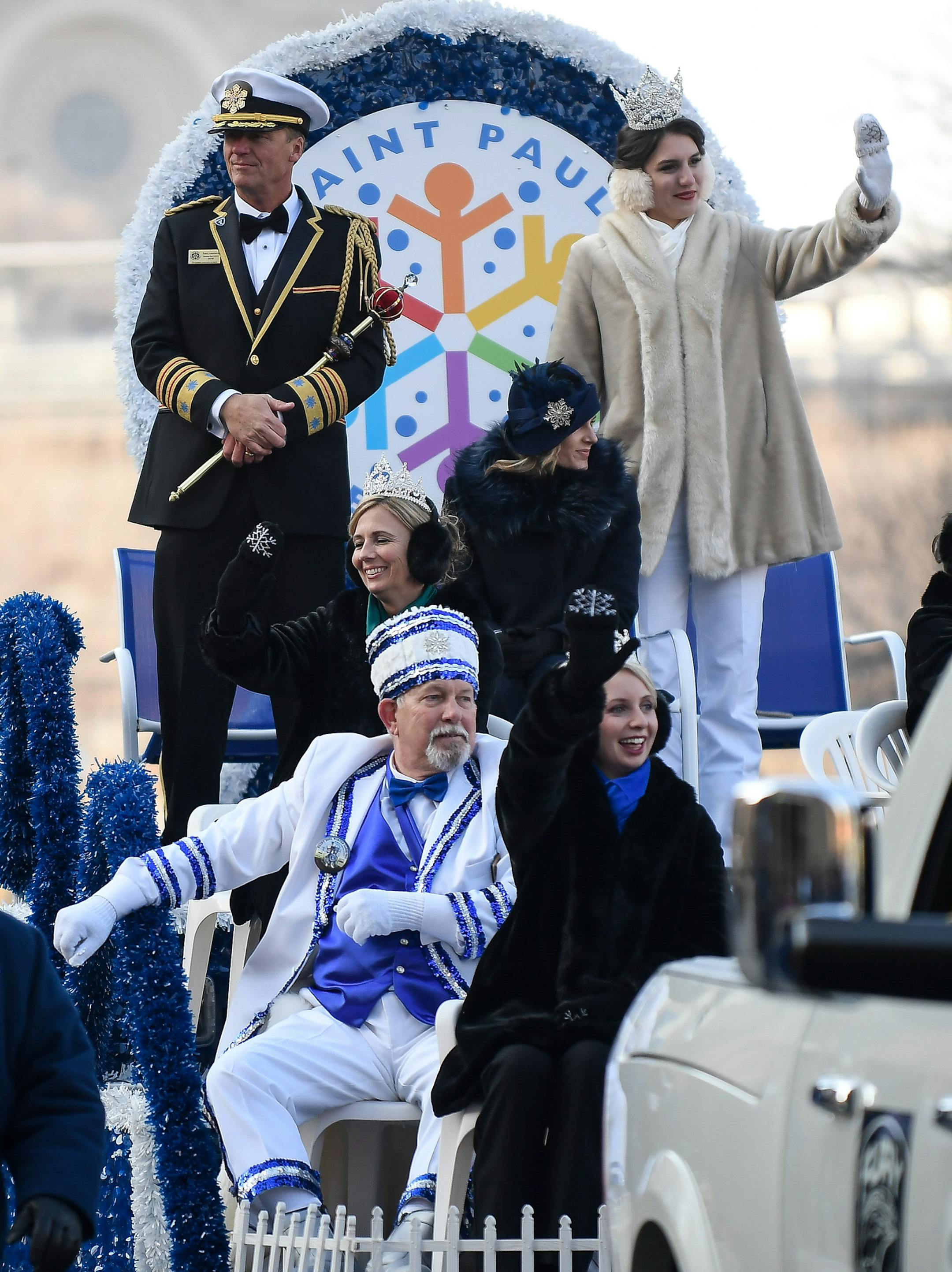 Back left, Tom Leonard, King Boreas LXXXII, left, and Jilla Nadimi, who was crowned Aurora, Queen of Snows, waved to parade goers along with other Winter Carnival royalty Saturday. ] AARON LAVINSKY ï aaron.lavinsky@startribune.com The Winter Carnival's King Boreas Grand Day Parade was held Saturday, Jan. 27, 2018 in St. Paul, Minn.