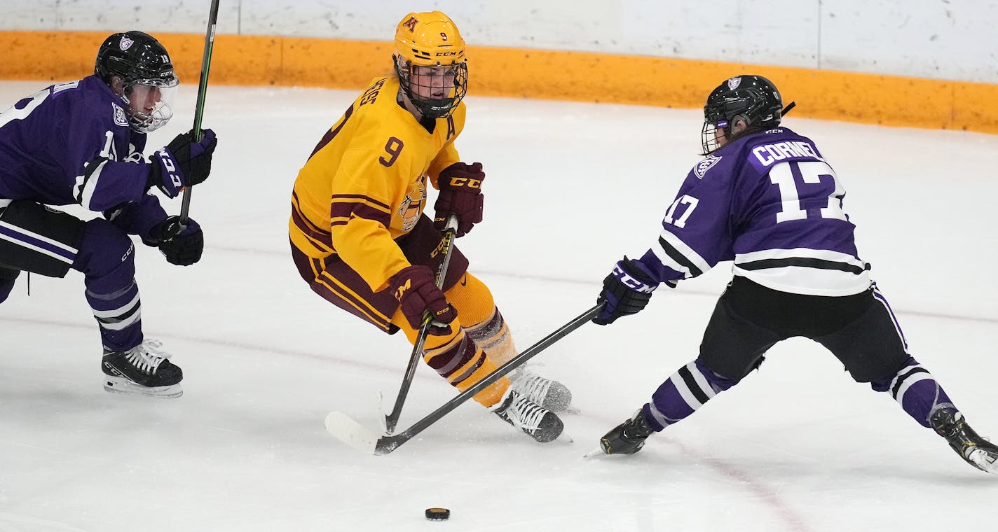 Minnesota forward Taylor Heise (9) took the puck around St. Thomas defenseman Megan Cornell (17) in the first period of an NCAA women's hockey game between the Minnesota Golden Gophers and the St. Thomas Tommies Saturday, Jan. 8, 2022 at Ridder Arena in Minneapolis. ] ANTHONY SOUFFLE • anthony.souffle@startribune.com