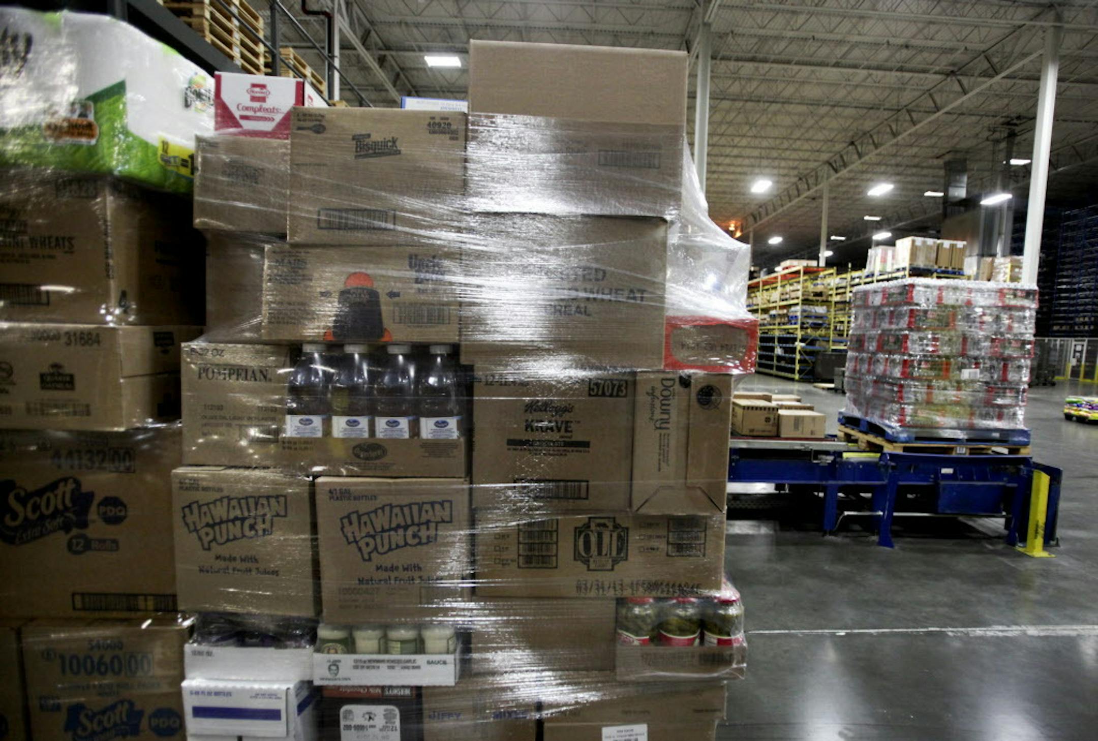 Grocery orders are wrapped in plastic before being transported from Supervalu's grocery distribution center Wednesday, Jan. 23, 2013, in Hopkins, MN. Supervalu has 1.7 million square feet of distribution space.] (DAVID JOLES/STARTRIBUNE) djoles@startribune.com Until 2006, almost half of Supervalu's business came from wholesaling, the company's original reason for being in back in the 1920s. Its purchase of Albertson's turned into more of a supermarket retail company, with wholesaling less than 2