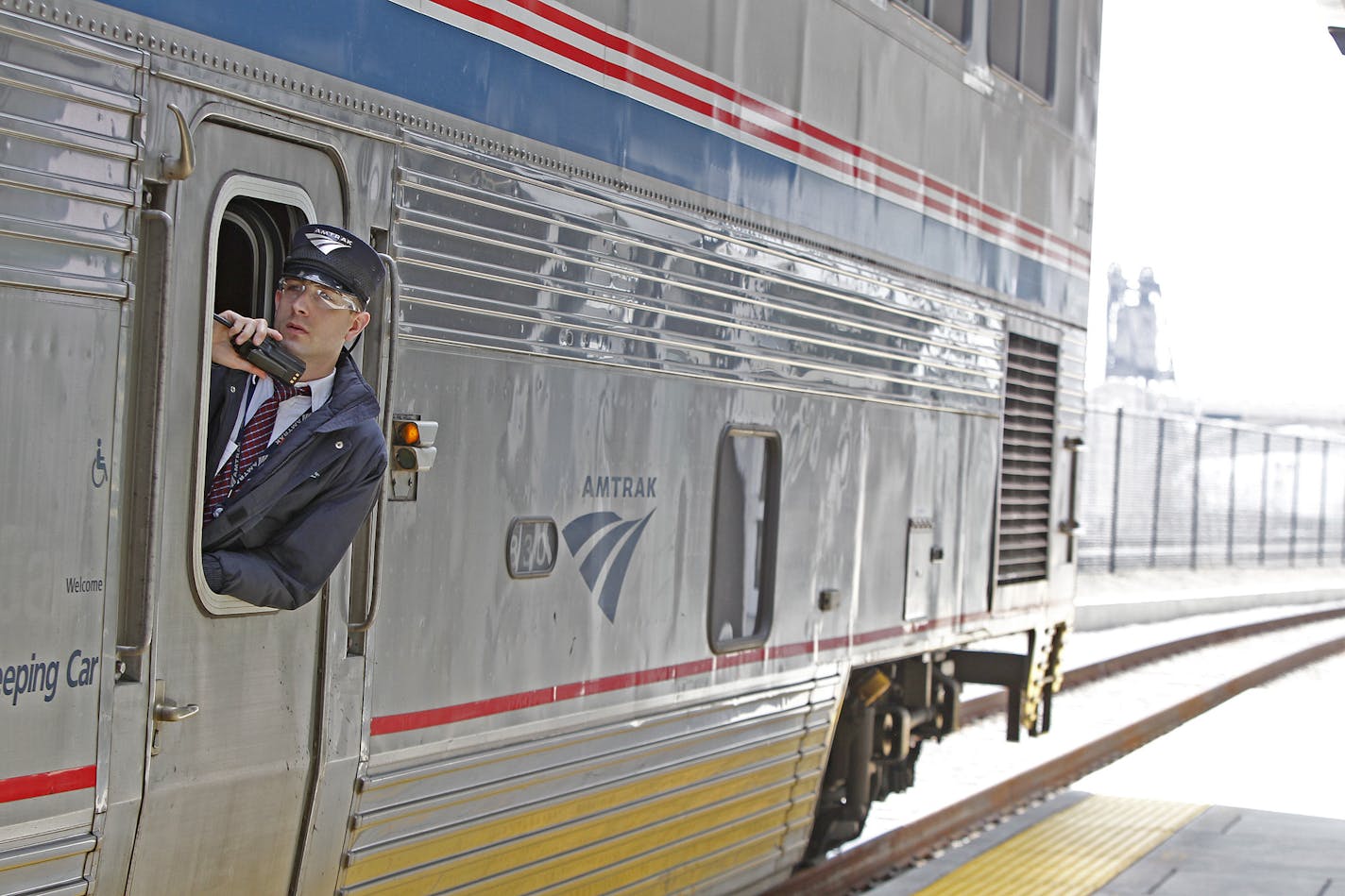 A conductor announced the departure of an Amtrak at the Union Depot, Thursday, May 8, 2014 in St. Paul, MN. It is the first passenger train in more than 40 years to stop at the refurbished Union Depot. ] (ELIZABETH FLORES/STAR TRIBUNE) ELIZABETH FLORES &#xa5; eflores@startribune.com ORG XMIT: MIN1405081400306852