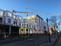 Seasonal construction jobs upped the state's employment picture in April. Pictured is construction of the Vicinity Apartments in Minneapolis. (Photo b