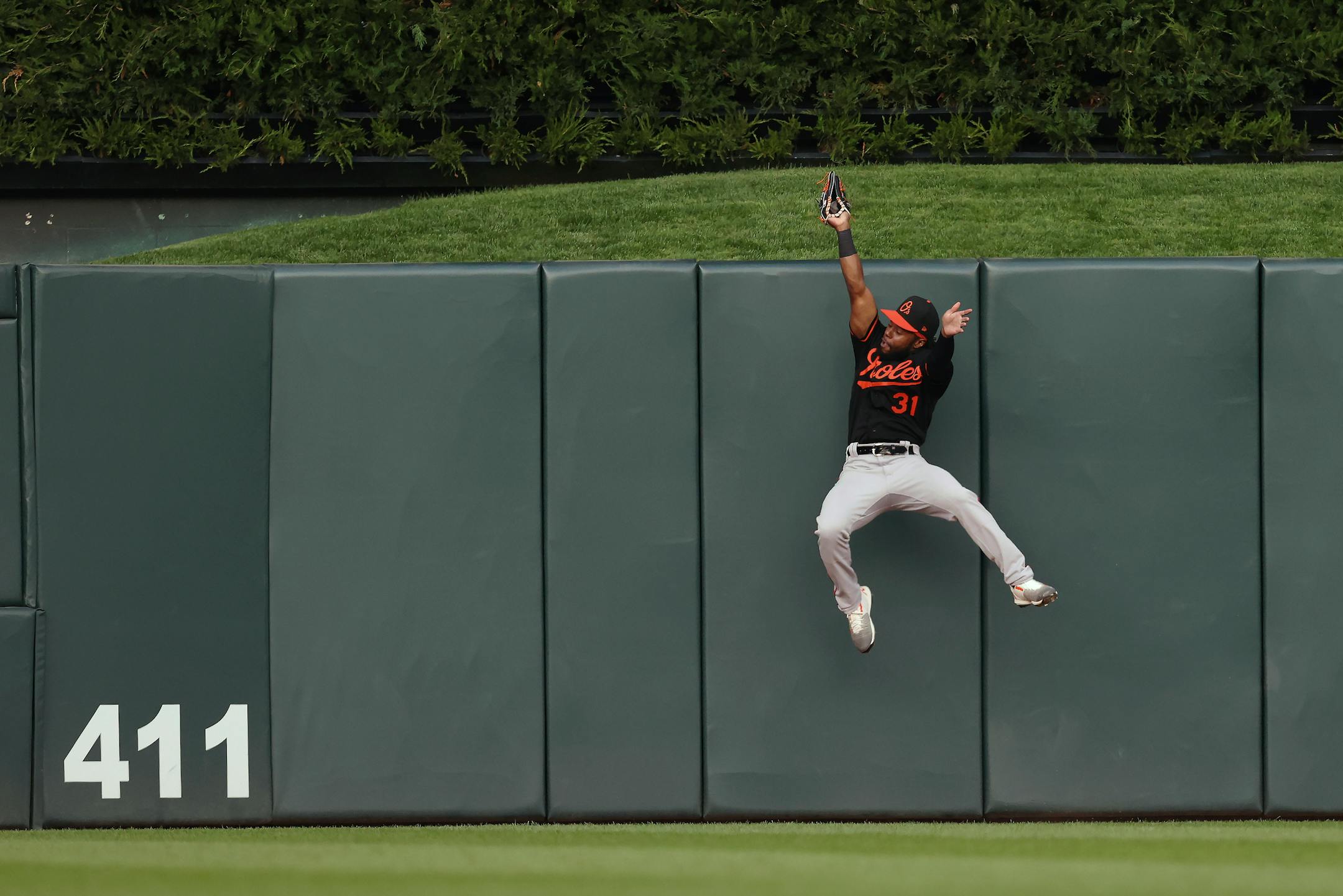Orioles center fielder Cedric Mullins caught a fly ball hit by Byron Buxton during the fourth inning Friday, robbing Buxton of a three-run home run.