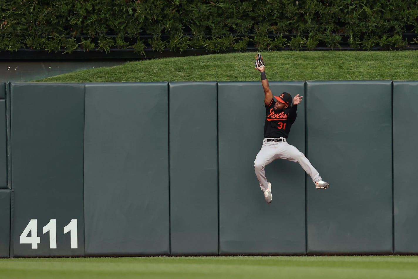 Orioles center fielder Cedric Mullins caught a fly ball hit by Byron Buxton during the fourth inning Friday, robbing Buxton of a three-run home run.