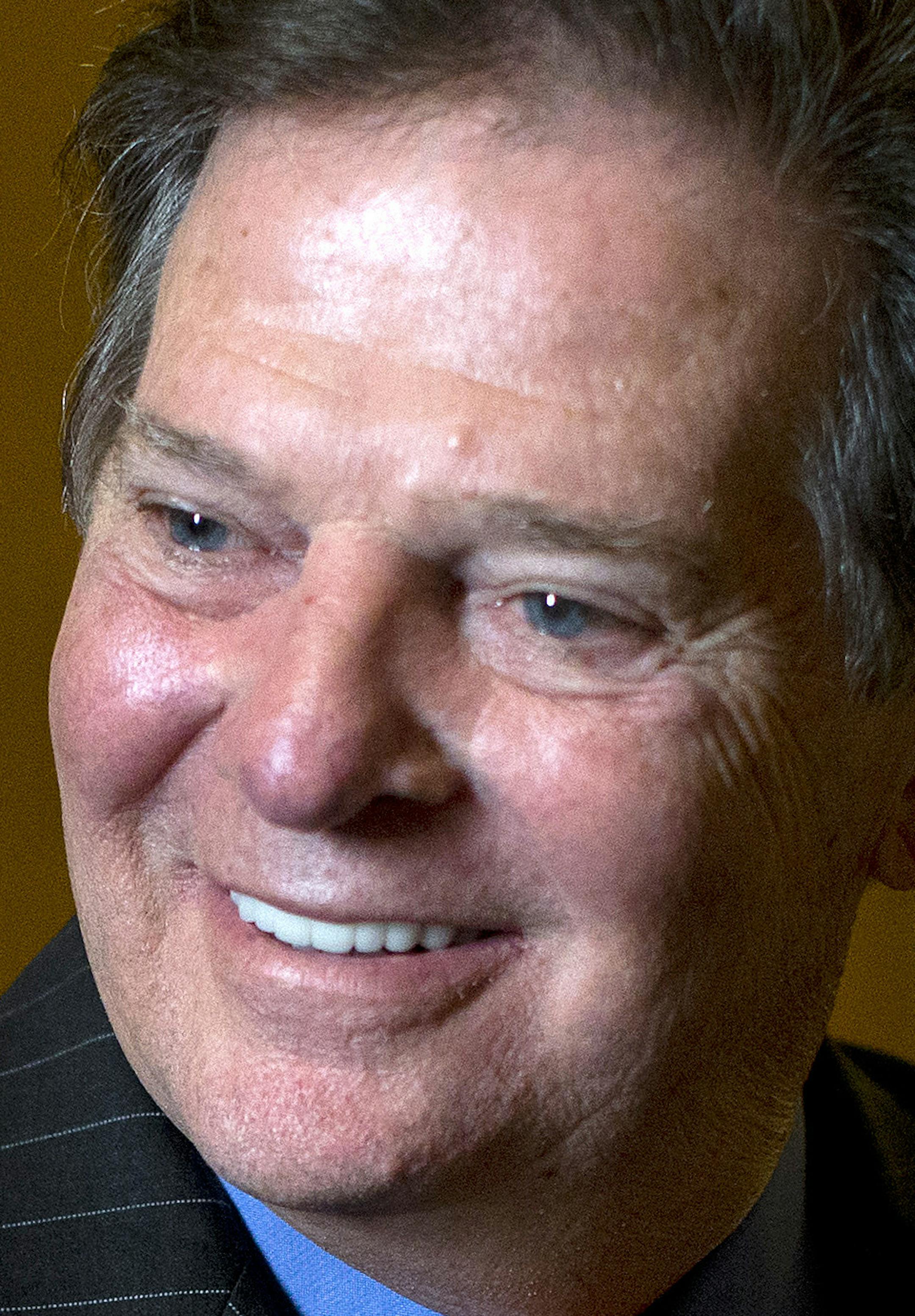 Former House Majority Leader Tom DeLay smiles as he leaves a lunch meeting on Capitol Hill, Thursday, Sept. 19, 2013, in Washington. A Texas appeals court tossed the criminal conviction of DeLay on Thursday, saying there was insufficient evidence for a jury in 2010 to have found him guilty of illegally funneling money to Republican candidates. (AP Photo/Carolyn Kaster)