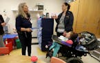 Jolie Holland, left, a Licensed School Nurse in the Howard Lake-Waverly-Winstead School district, spoke with Heidi Joy Bursch, an Early Childhood Spec