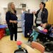 Jolie Holland, left, a Licensed School Nurse in the Howard Lake-Waverly-Winstead School district, spoke with Heidi Joy Bursch, an Early Childhood Spec