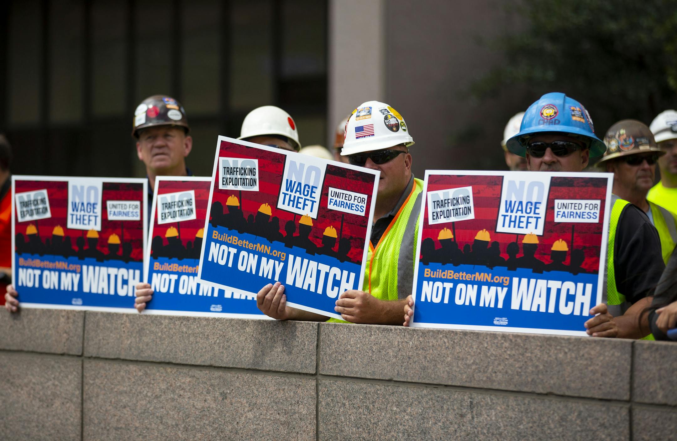 Dozens of workers held up signs that bore the name of their new movement " Not On My Watch" during the rally on Monday. ALEX KORMANN • alex.kormann@startribune.com Dozens of workers gathered in front of the Hennepin County Government Center to rally in support of a new city ordinance that would provide protection for employees against wage theft. After the rally a few supporters attended a city council meeting to air their thoughts before the council voted on the measure.