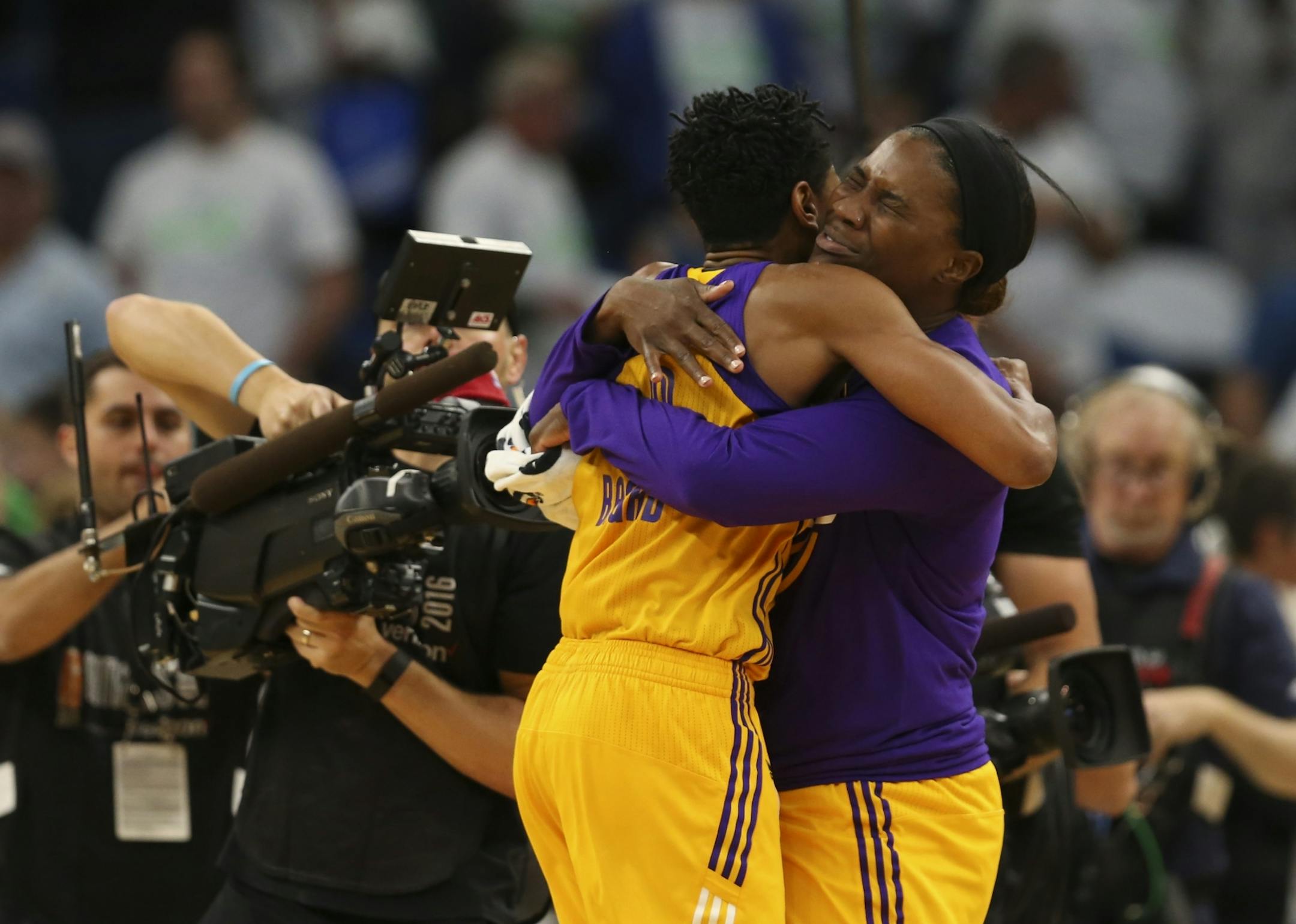 Jantel Lavender, right, hugged Sparks guard Alana Beard after Beard hit a shot to beat the Lynx in October.