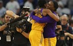 Jantel Lavender, right, hugged Sparks guard Alana Beard after Beard hit a shot to beat the Lynx in October.