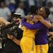 Jantel Lavender, right, hugged Sparks guard Alana Beard after Beard hit a shot to beat the Lynx in October.