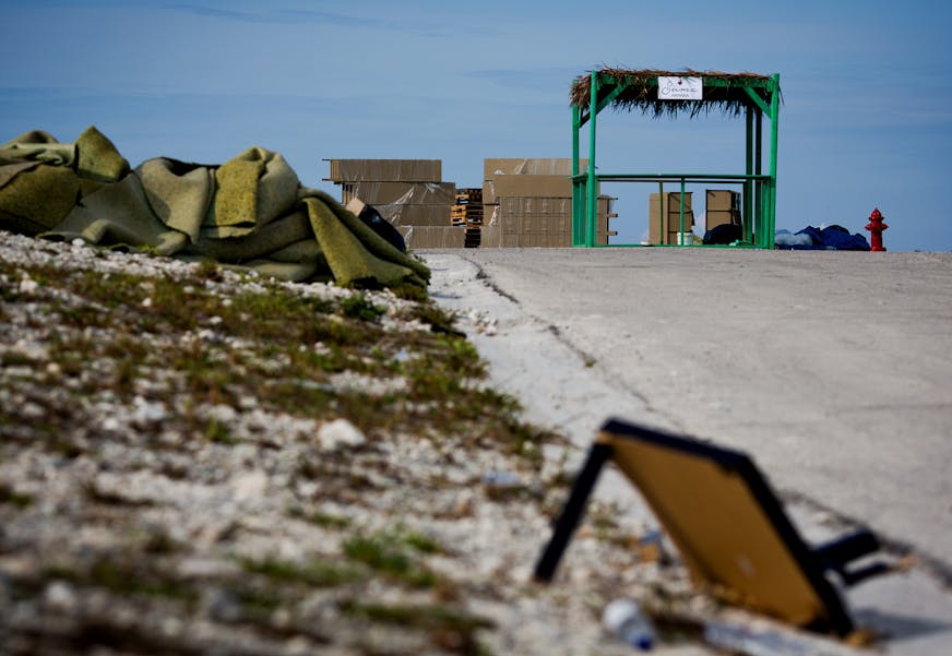 FILE -- Trash, discarded materials and remnants of the failed Fyre Festival remain on the festival site in Exuma, the Bahamas, May 14, 2017. A Bahamian restaurant owner who lost a fortune as a result of the Fyre Festival debacle has recouped nearly all of her losses after a GoFundMe campaign raised more than $167,000. (Scott McIntyre/The New York Times)