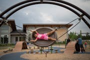 Mya Ferrell, 5, enjoys a unique swing on her last day of summer before she started kindergarten at Ojibwa Park on Tuesday, Sept. 5, 2023 in Woodbury, 