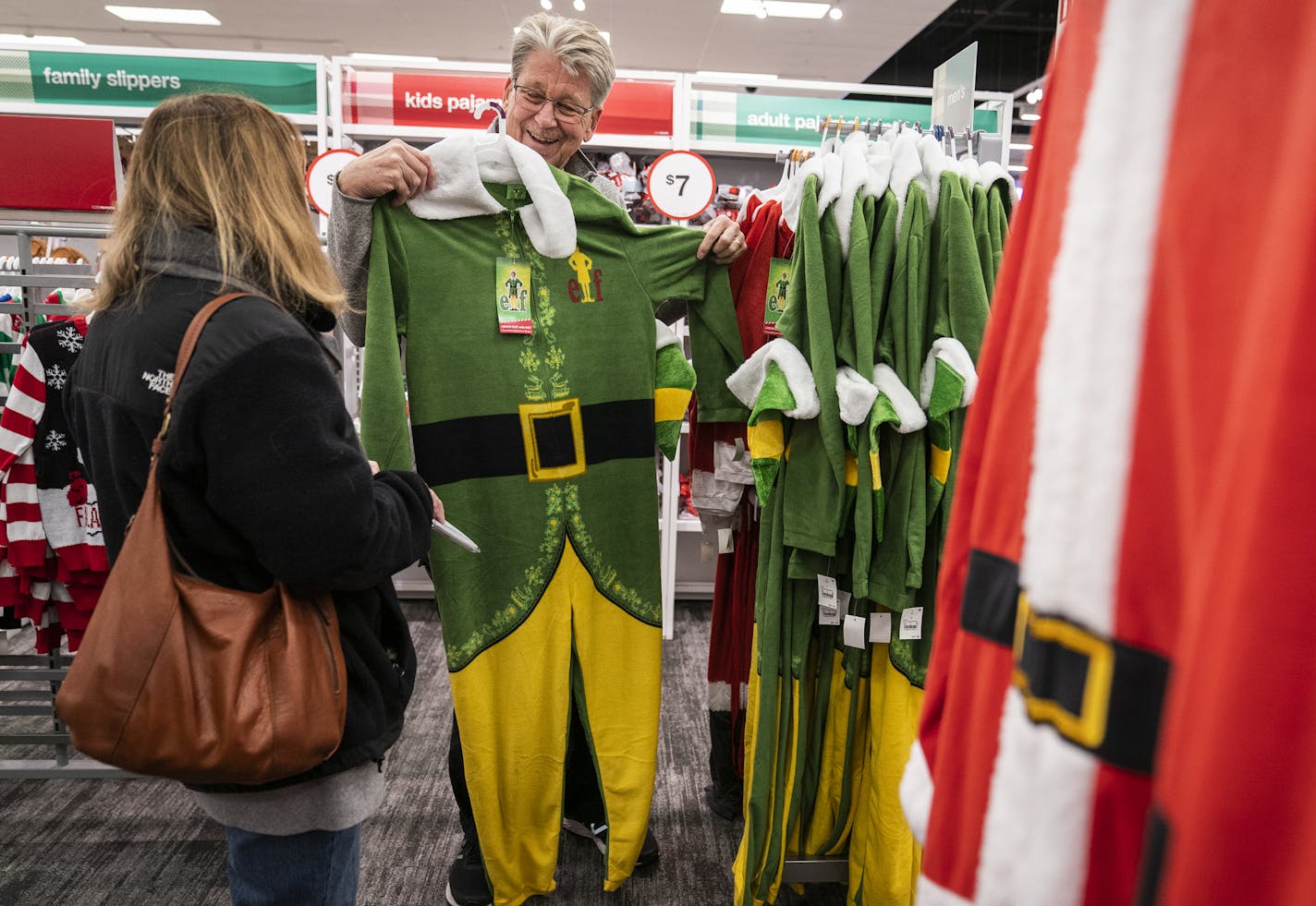 Paul Hokeness of Minneapolis shopped for festive pajamas with his wife Peg for a family Christmas pajama party they host every year. ] LEILA NAVIDI &#x2022; leila.navidi@startribune.com BACKGROUND INFORMATION: Target in Edina on Thursday, November 21, 2019.