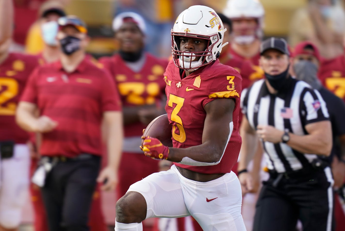 FILE - In this Oct. 10, 2020, file photo, Iowa State running back Kene Nwangwu runs up field during the second half of an NCAA college football game against Texas Tech in Ames, Iowa. One of the biggest problems for the Minnesota Vikings last season was the performance of their special teams units. They made improvement there a clear priority on the third day of the draft by selecting Iowa State running back Kene Nwangwu in the fourth round, and Iowa wide receiver Ihmir Smith-Marsette in the fifth round. (AP Photo/Charlie Neibergall, File)