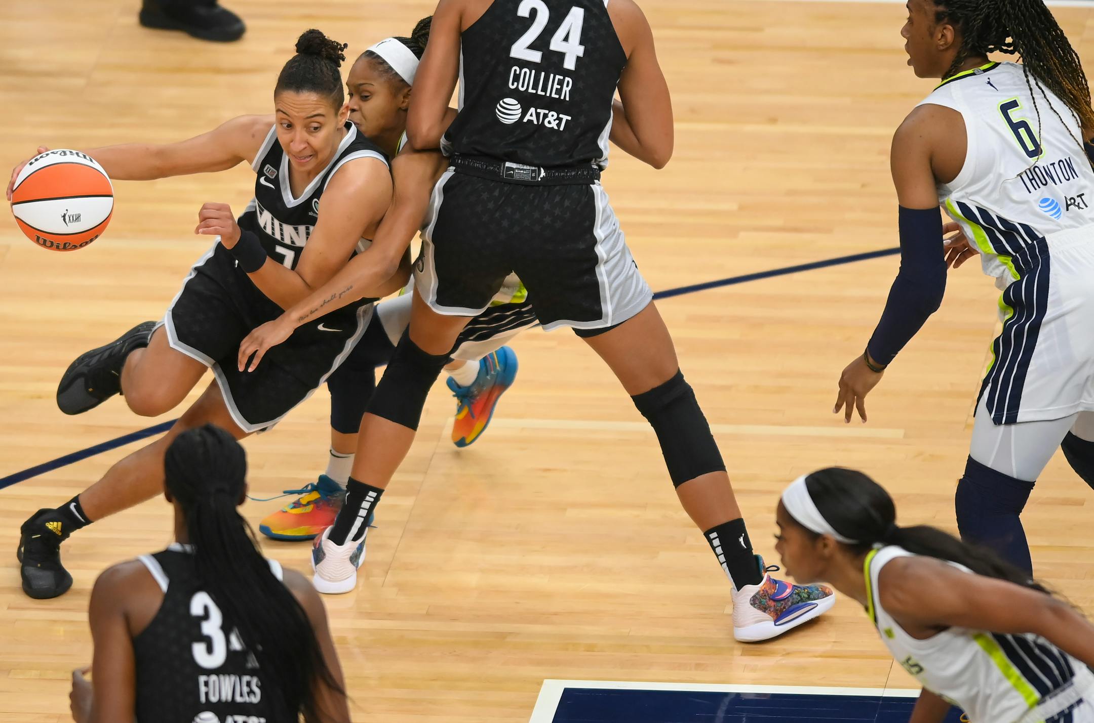 Minnesota Lynx guard Layshia Clarendon, left, drove toward the basket off a pick and roll in the second half against the Dallas Wings.