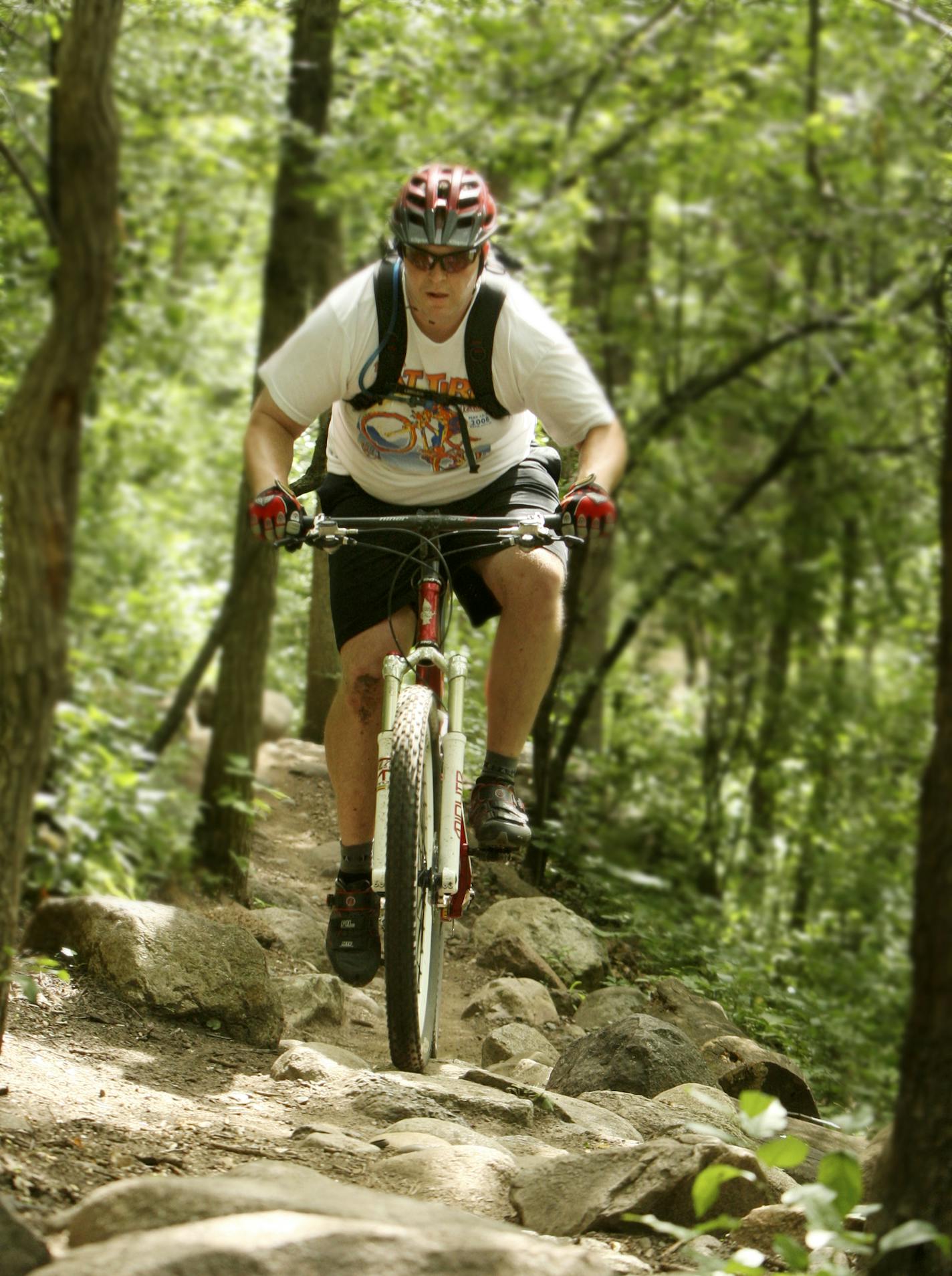 Courtesy of Dakota County Lebanon Hills has become a mecca for mountain bikers as a result of a collaboration between a mountain bike organization and the county. The county had the land and the bike group built trails on it and maintains them. Now since the county opened a restroom and parking lot at the trail head women and families have joined the typically male group of bikers.