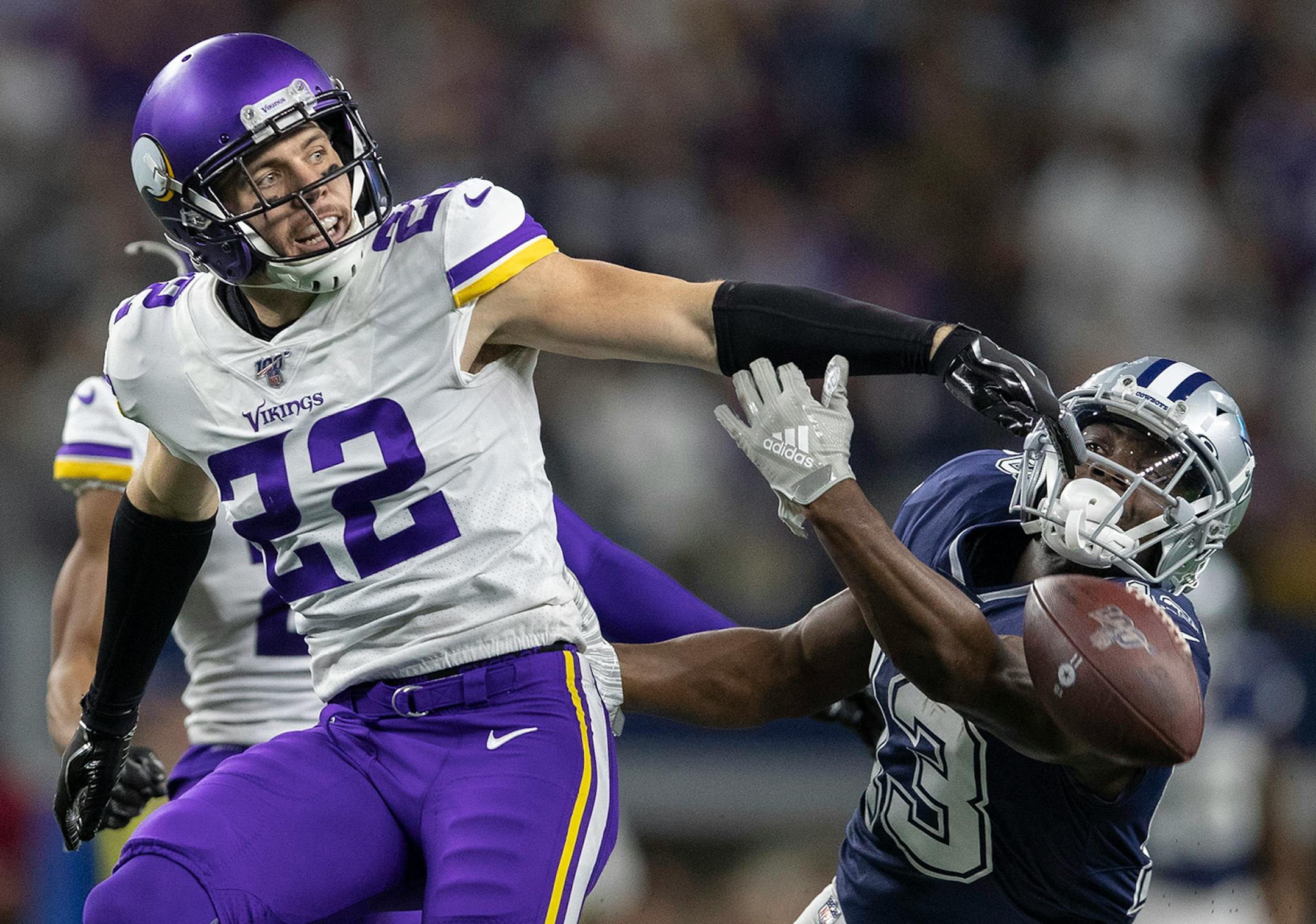 ARLINGTON, TX - NOVEMBER 10: Minnesota Vikings free safety Harrison Smith (22) broke up a pass in the second quarter intended for Dallas Cowboys wide receiver Michael Gallup (13) during an NFL football game on Sunday, November 10, 2019 at AT&T Stadium in Arlington, Texas. (Photo by Jerry Holt/Star Tribune via Getty Images)