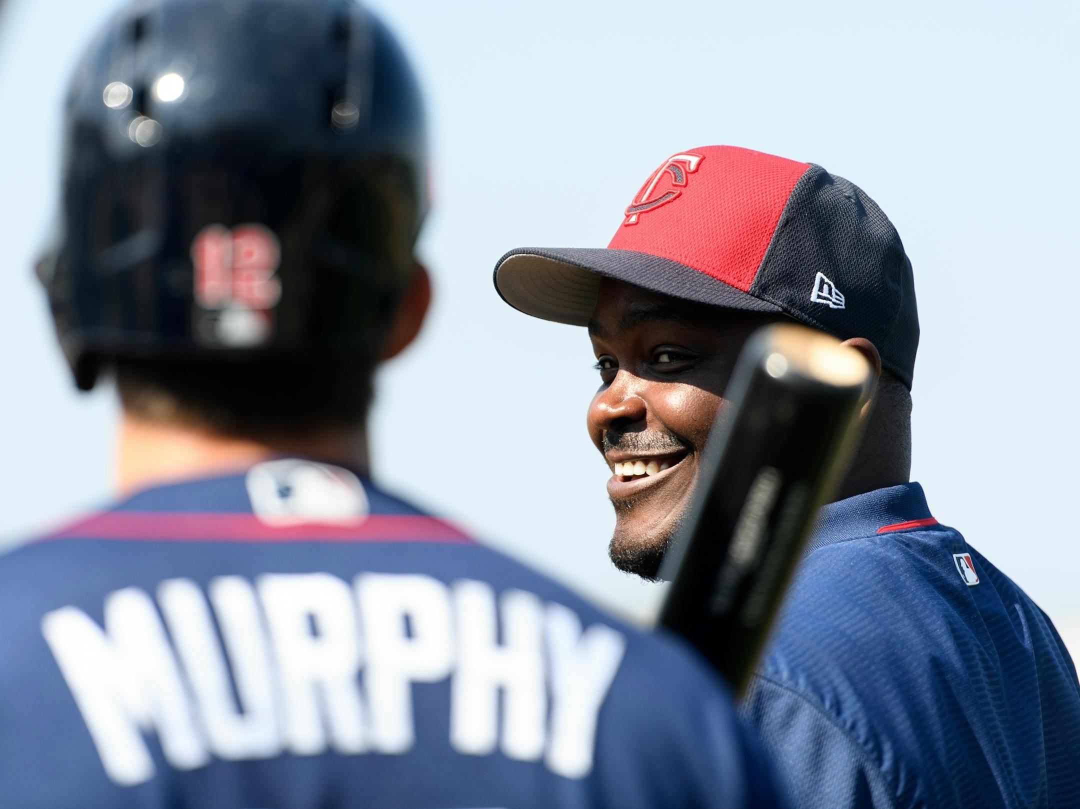 Twins hitting coach James Rowson talked to catcher John Ryan Murphy during batting practice Saturday.